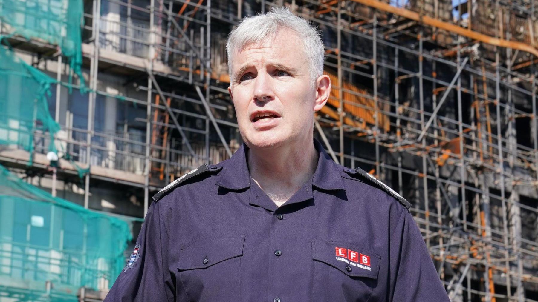 Andy Roe at the scene in Dagenham, London, following a blaze at a block of flats on Freshwater Road.