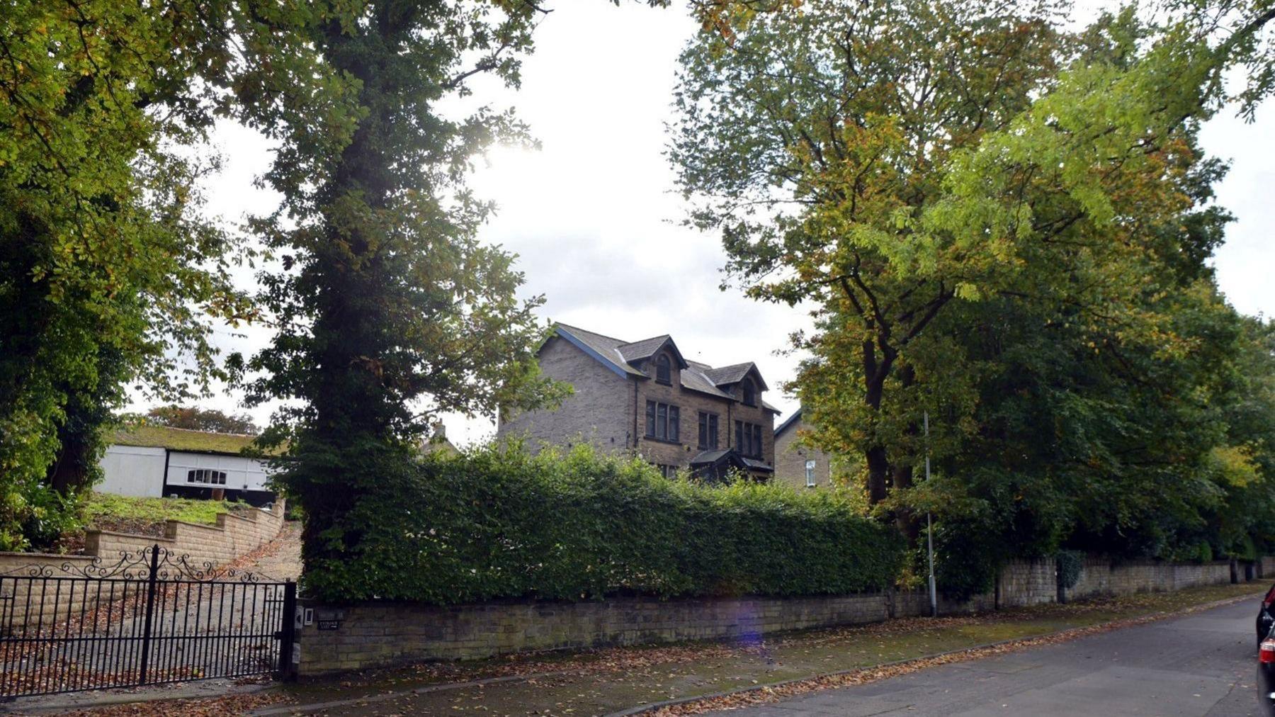 House and trees on Staveley Road in the Nab Wood area 