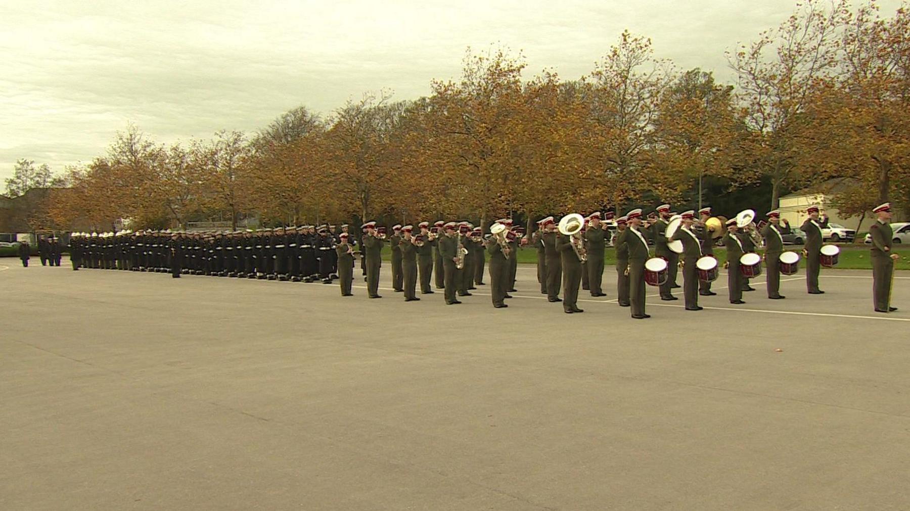 A long shot of the whole parade just before marching.