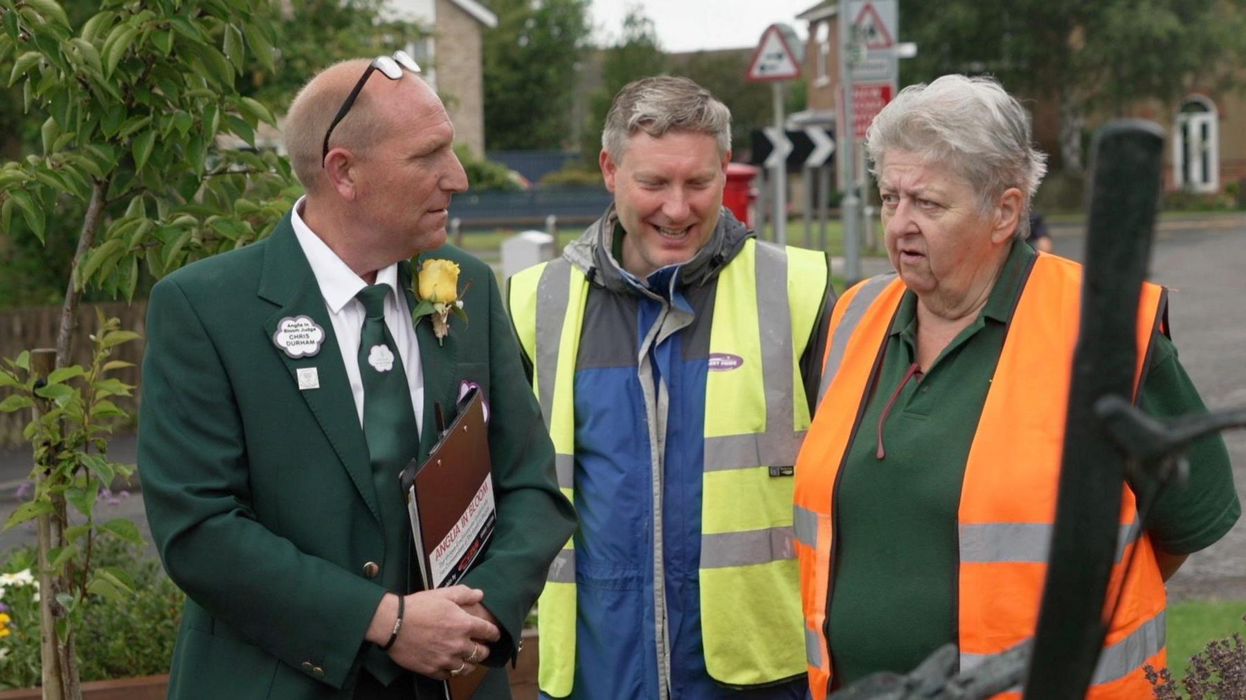 Chris Durham, judge from Anglia in Bloom, with two of Chatteris in Bloom team