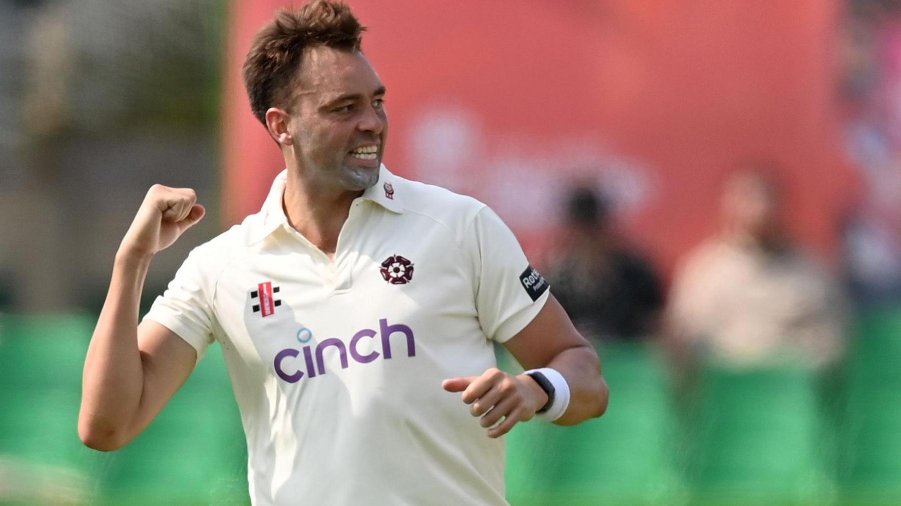 Harry Conway celebrates taking wicket