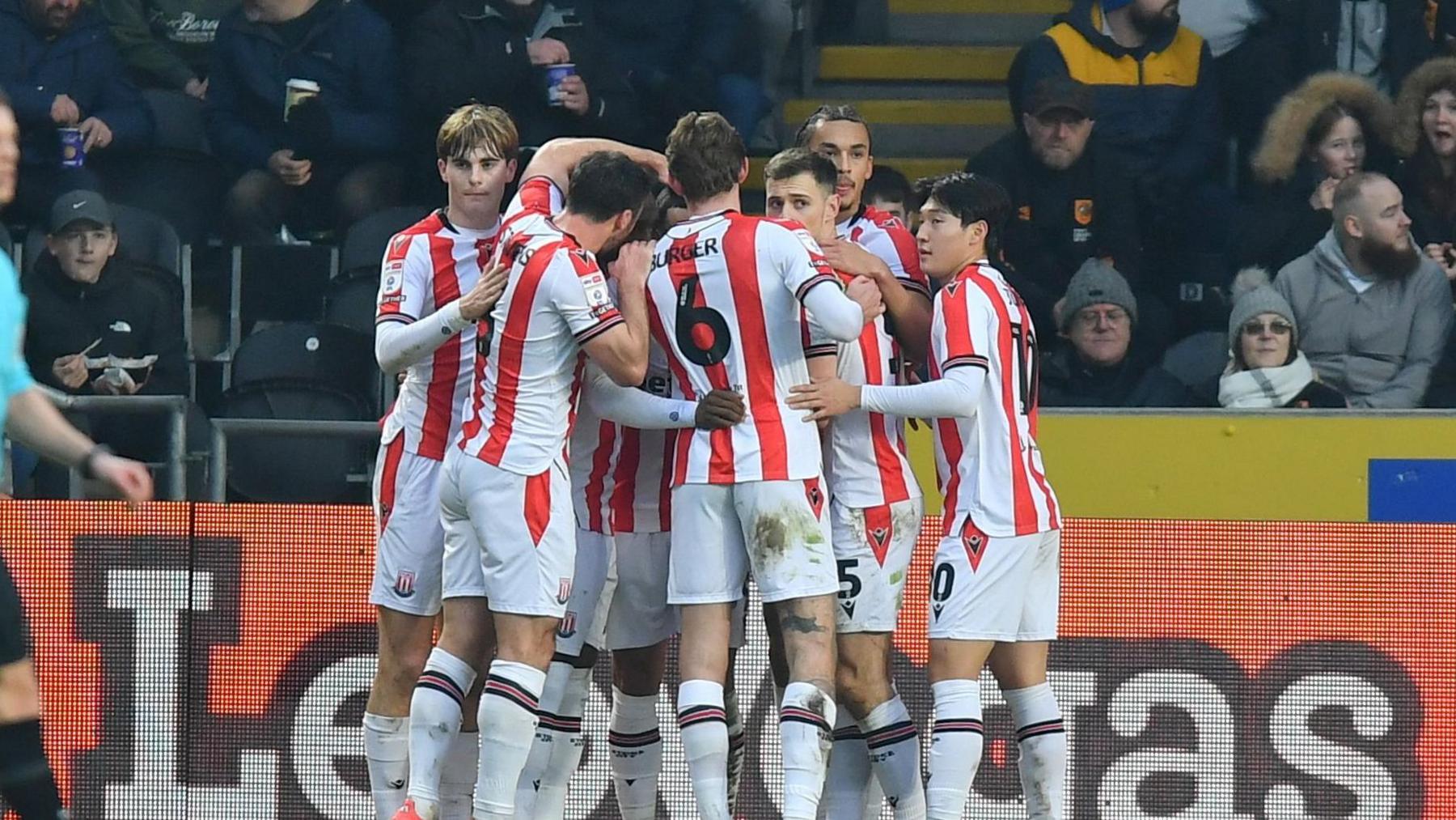 Stoke City's players celebrate Ali Al Hamadi's equaliser at Hull 