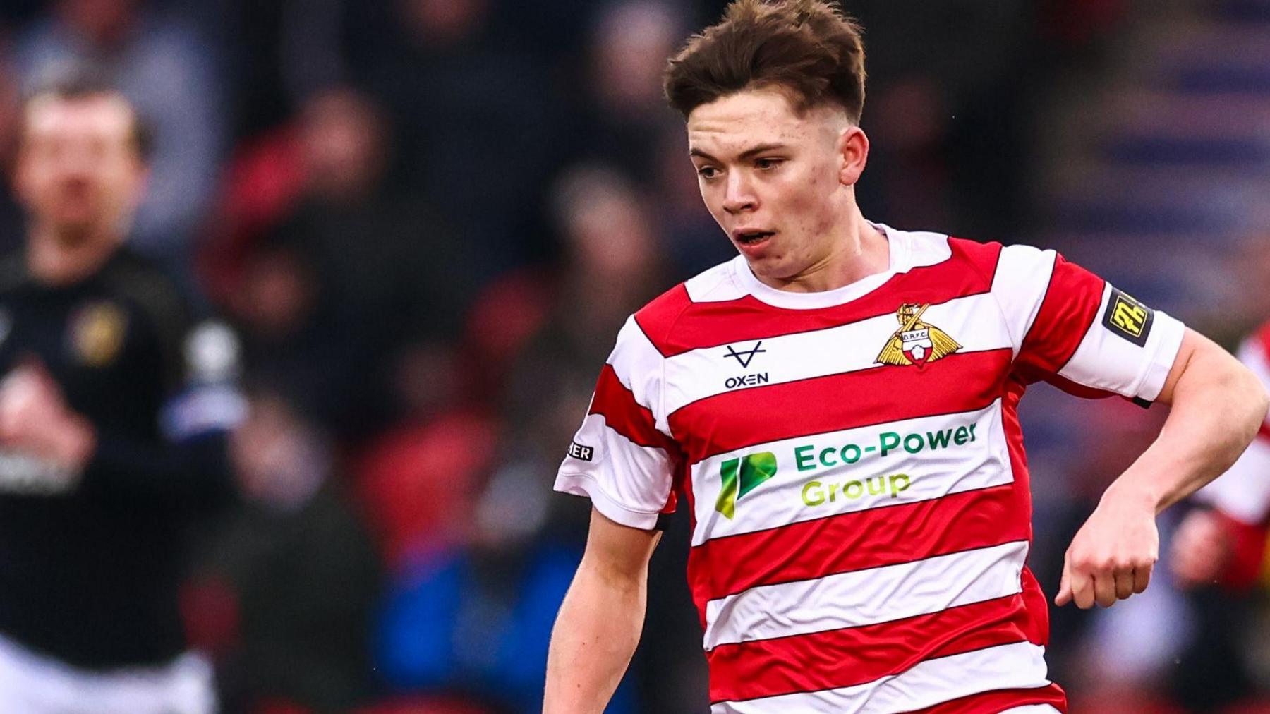 Midfielder Patrick Kelly in action for Doncaster