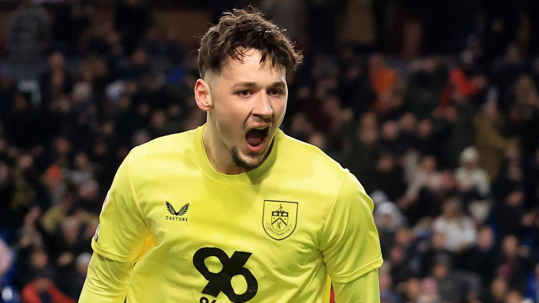 James Trafford celebrates saving a second penalty against Sunderland