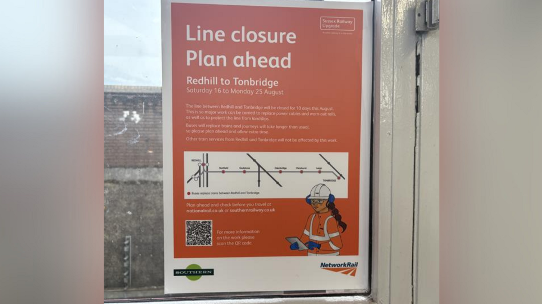 A sign at Tunbridge Wells train station advertising the upcoming closure of the Redhill to Tonbridge train line. The sign, which contains white text on an orange background, details the closure which will be in place between 16 and 25 August.