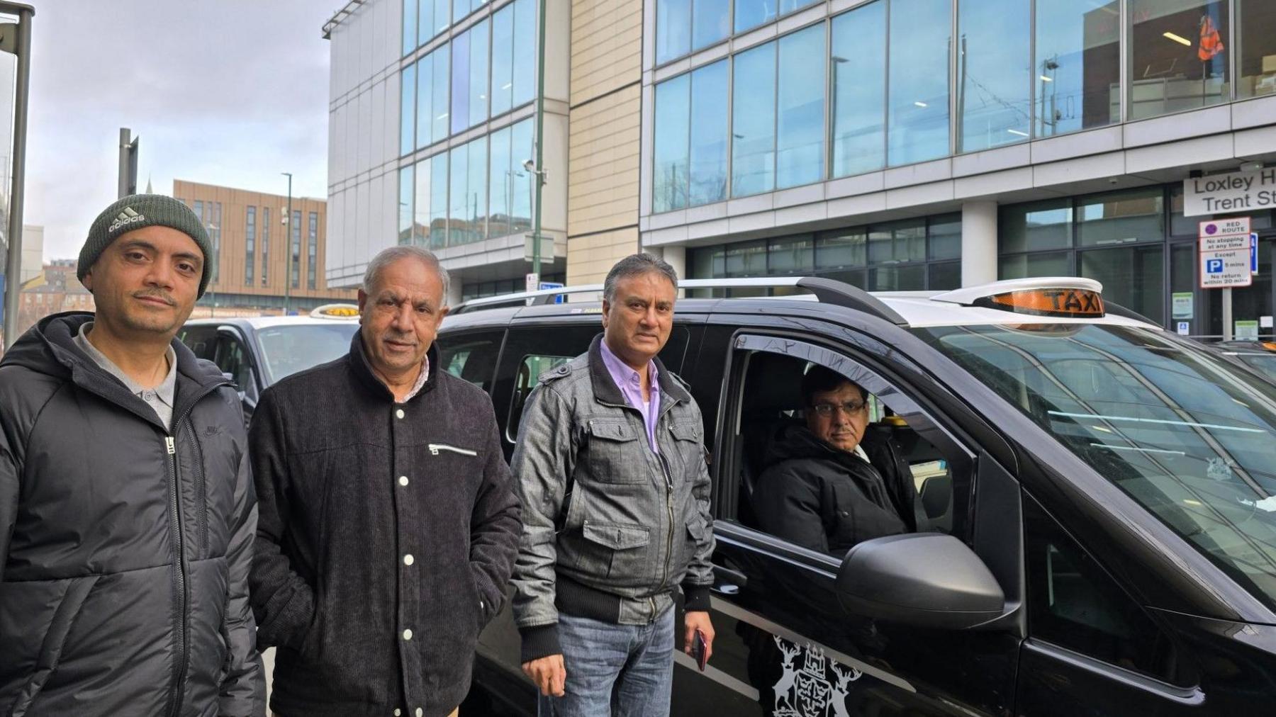 Taxi drivers Arfan Chaudhry, Mohammed Akram and Chander Sood, pictured in Trent Street 