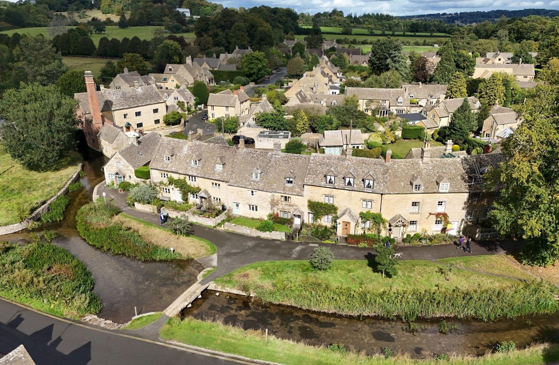 An aerial image of the village of Lower Slaughter in the Cotswolds