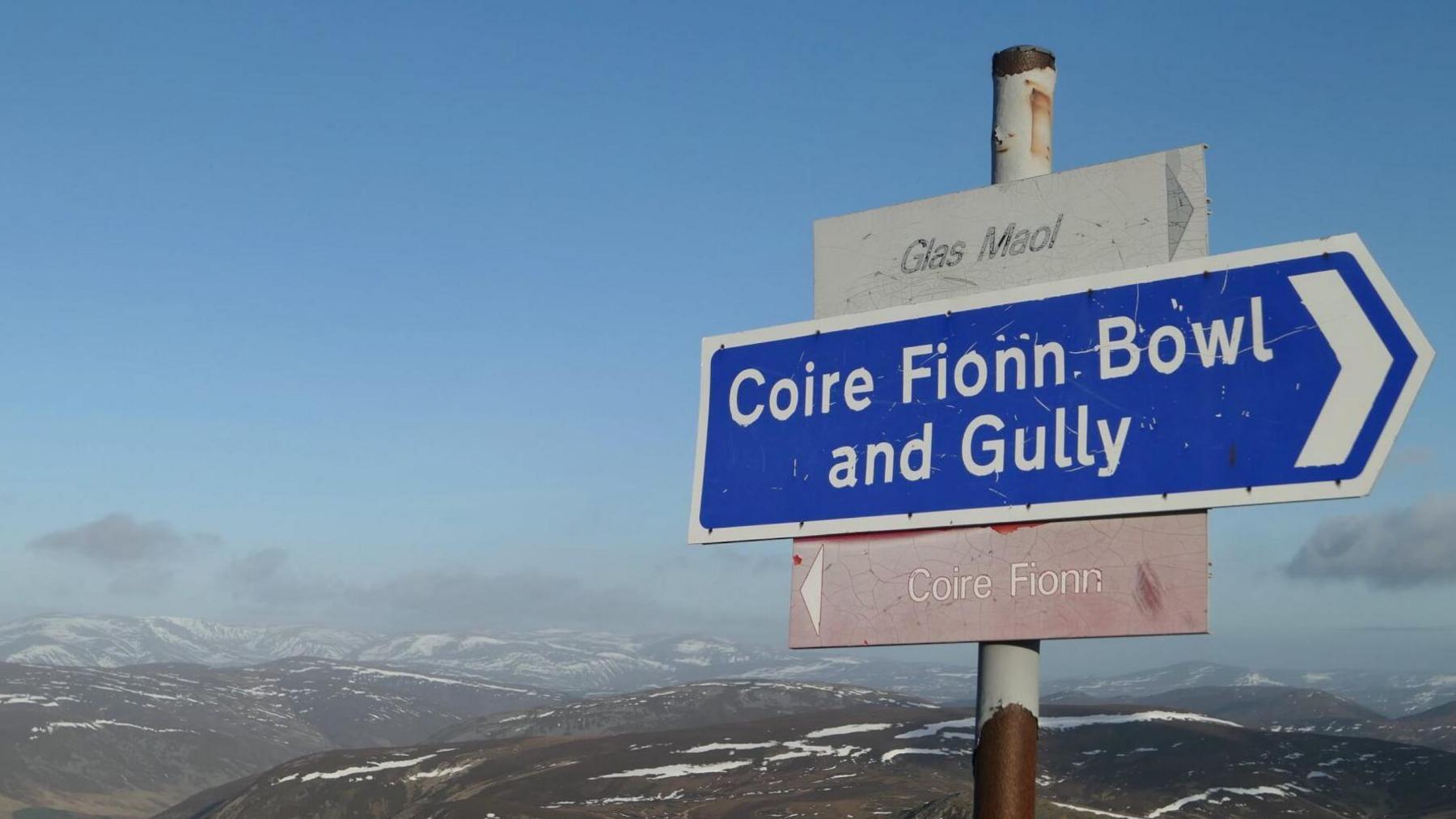 The signs read: "Glas Maol" "Coire Fionn Bowl and Gully" and "Coire Fionn"