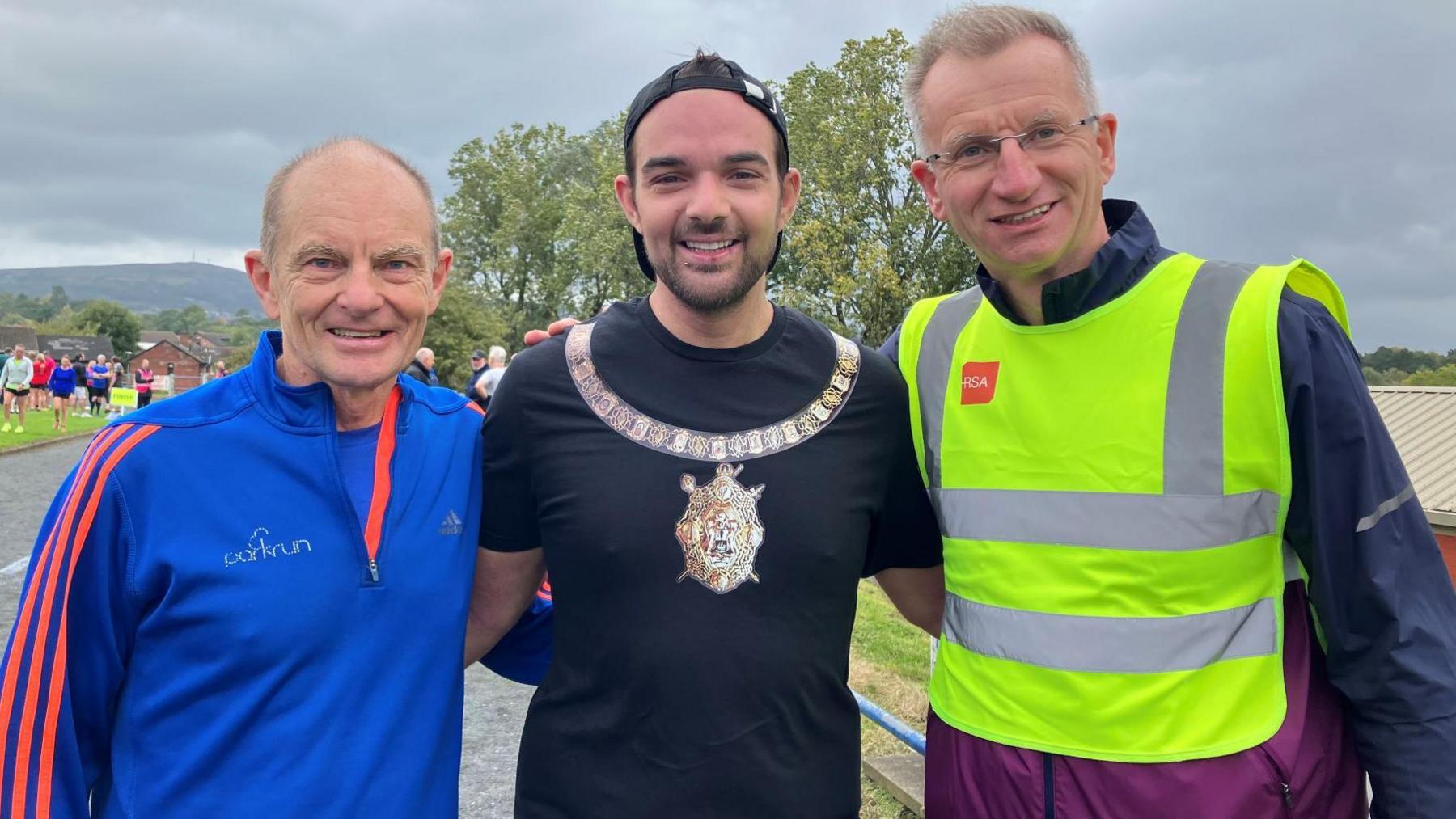 Belfast Lord Mayor Micky Murray (centre), Parkrun Ireland's Matt Shields (left) and Belfast North MLA Brian Kingston at Saturday's inaugural Paisley Park Parkrun