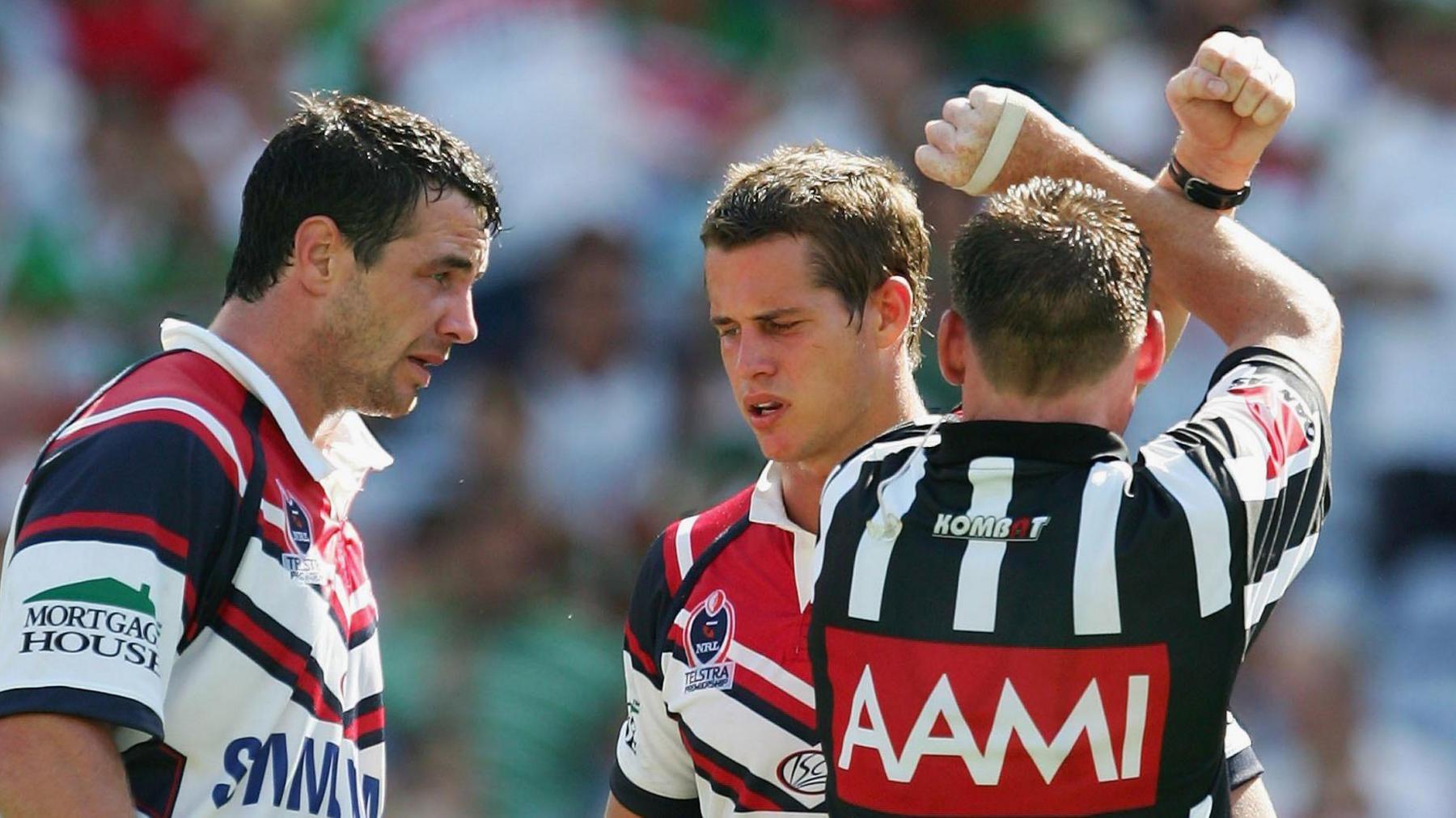 Adrian Morley stands before the referee who crosses his arms to indicate one of his tackles will be put on report and assessed by the disciplinary judiciary.