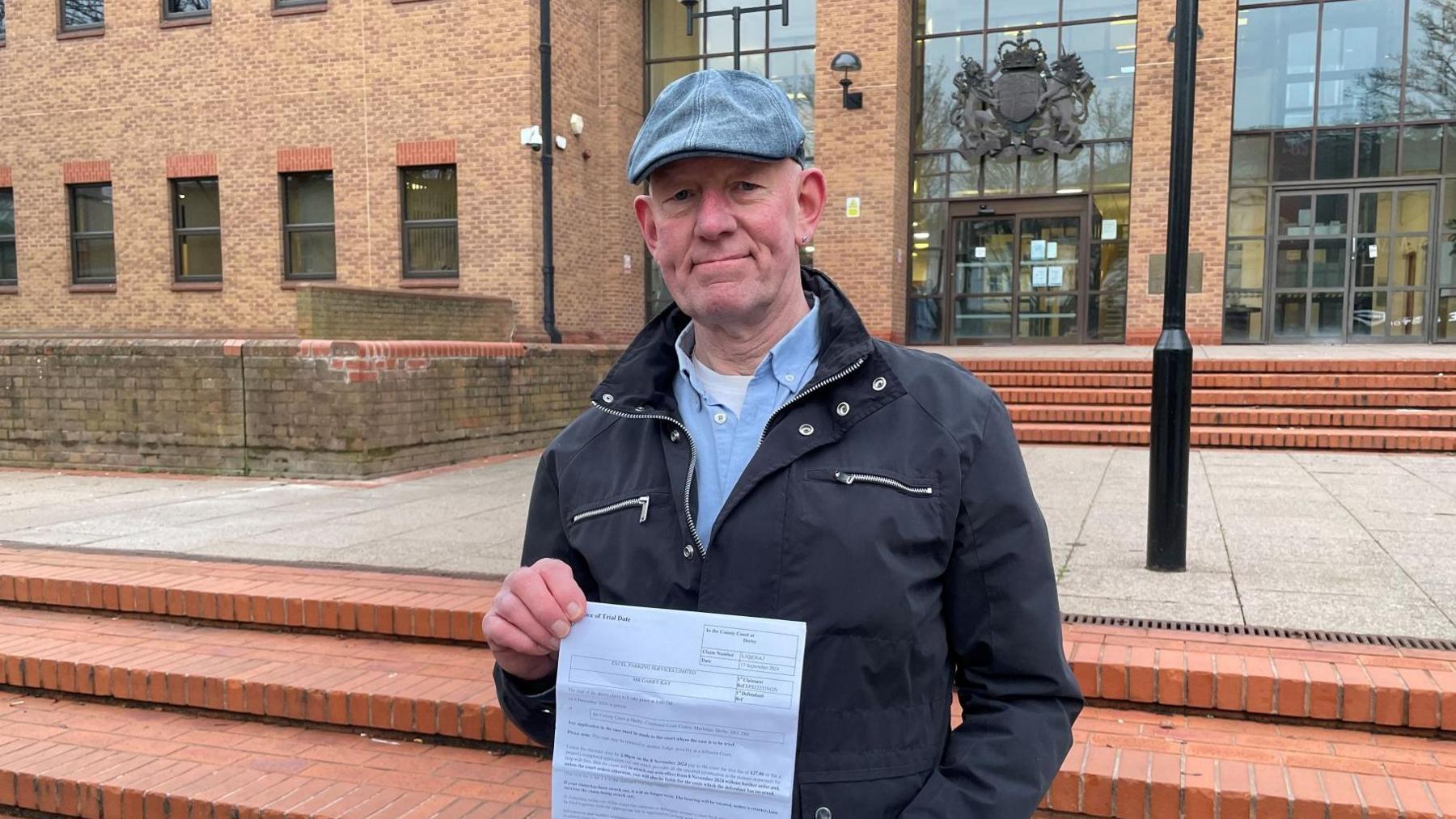 Garry Kay standing outside Derby Combined Court Centre on 6 December 2024