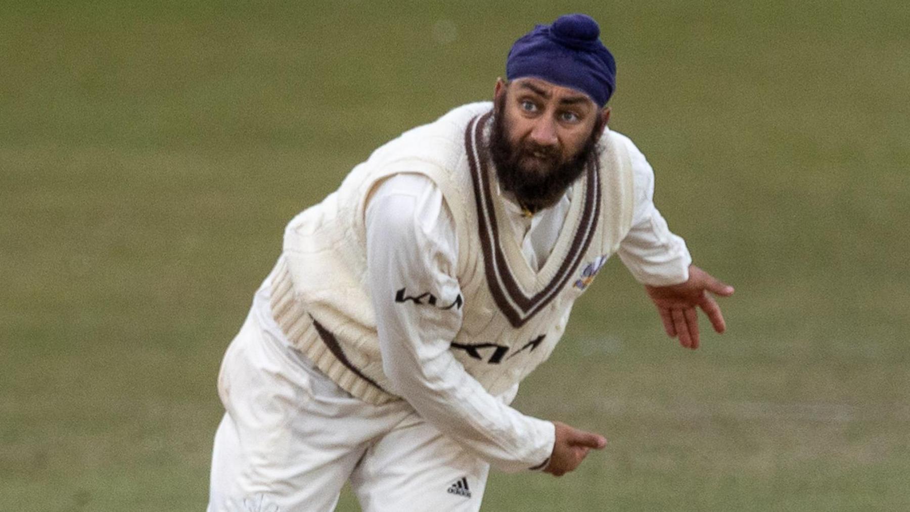 Amar Virdi bowling for Surrey