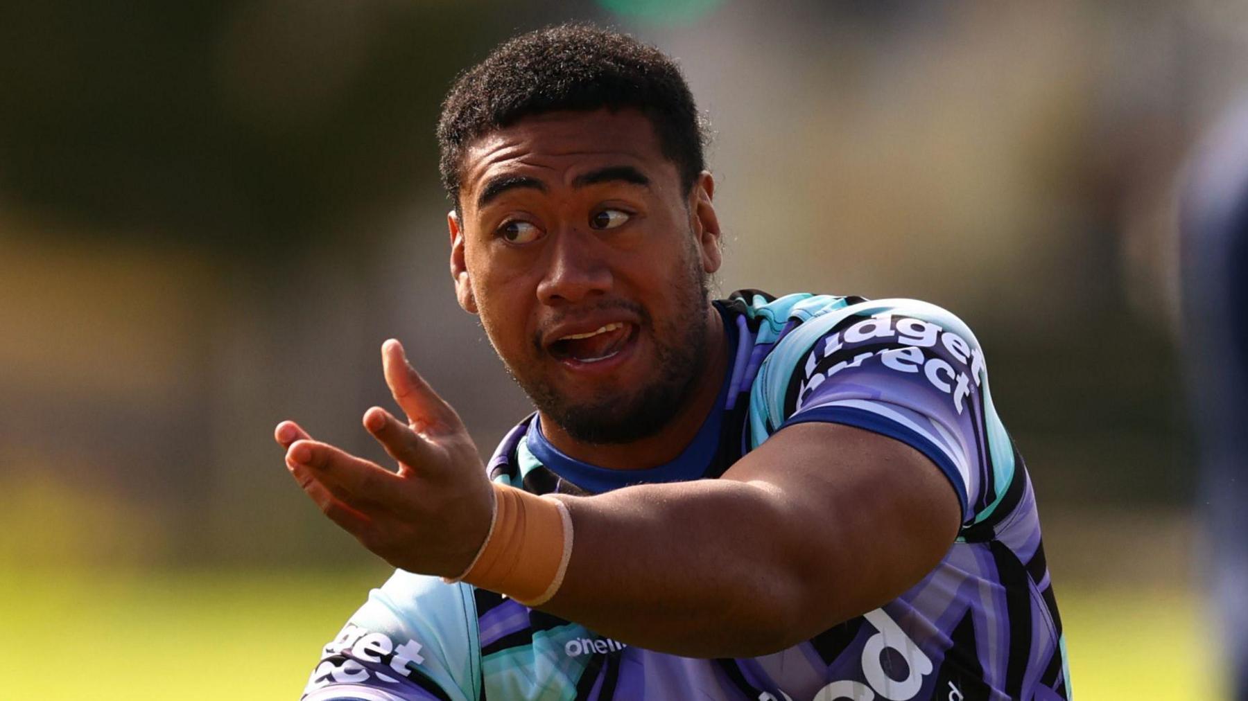 Lazarus Vaalepu having just passed the ball in a Melbourne Storm traning session 