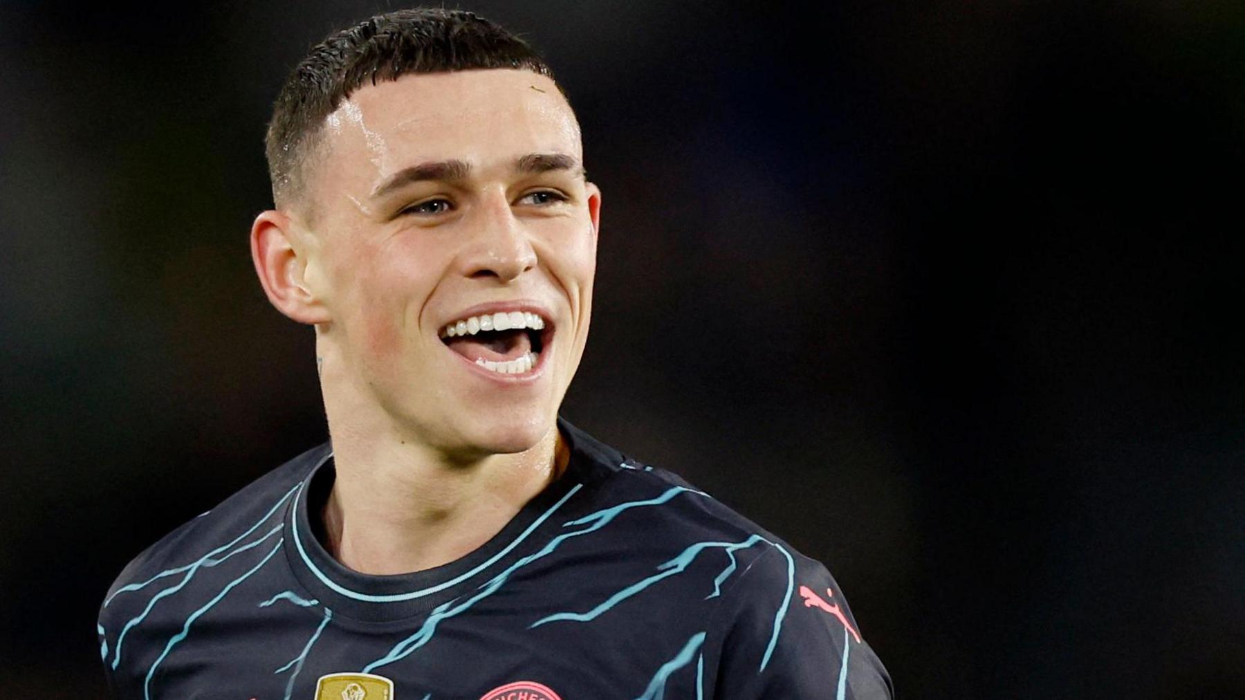 Phil Foden celebrates a goal for Manchester City