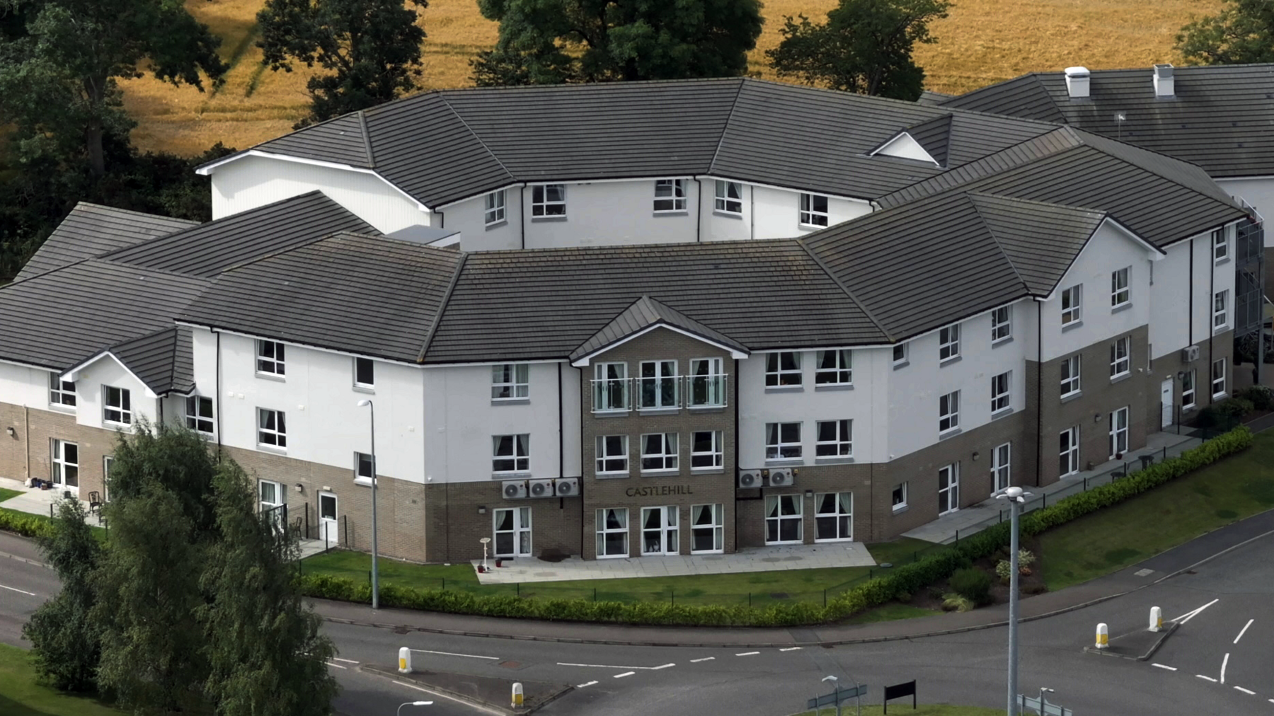 An exterior shot of a large modern care home