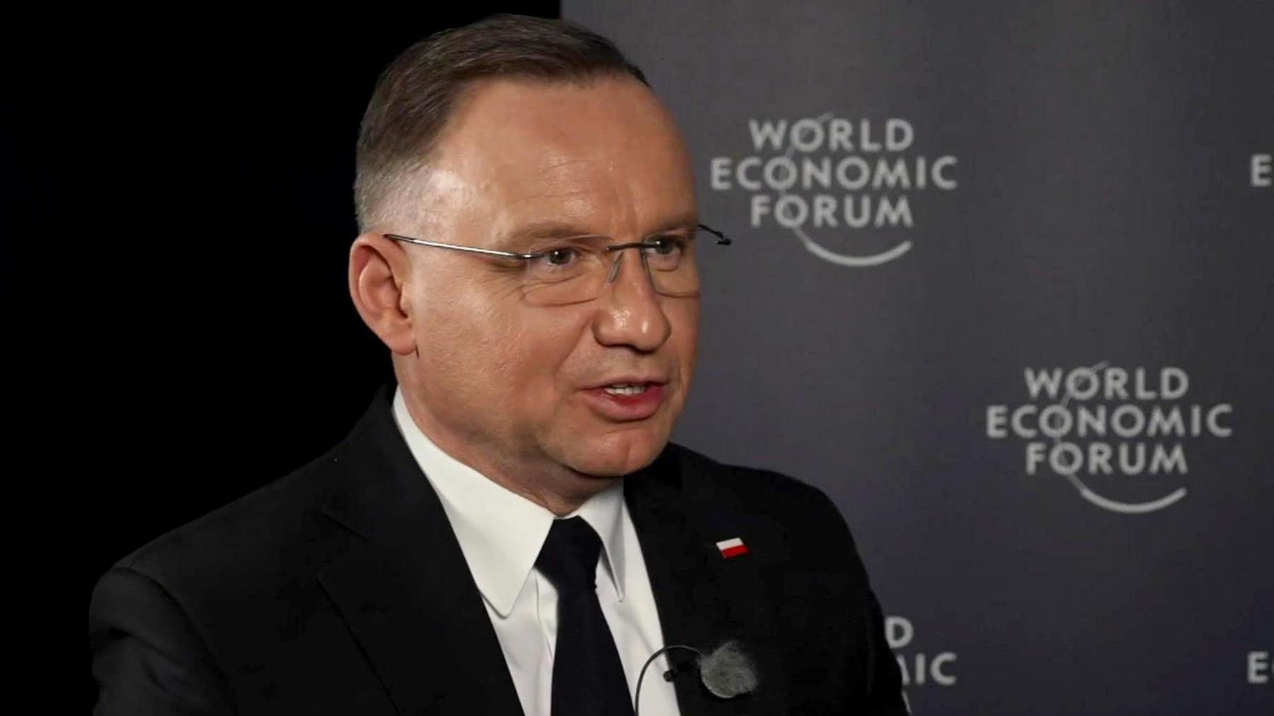 Poland's President Andrzej Duda in dark suit and white shirt at the World Economic Forum in Davos, Switzerland