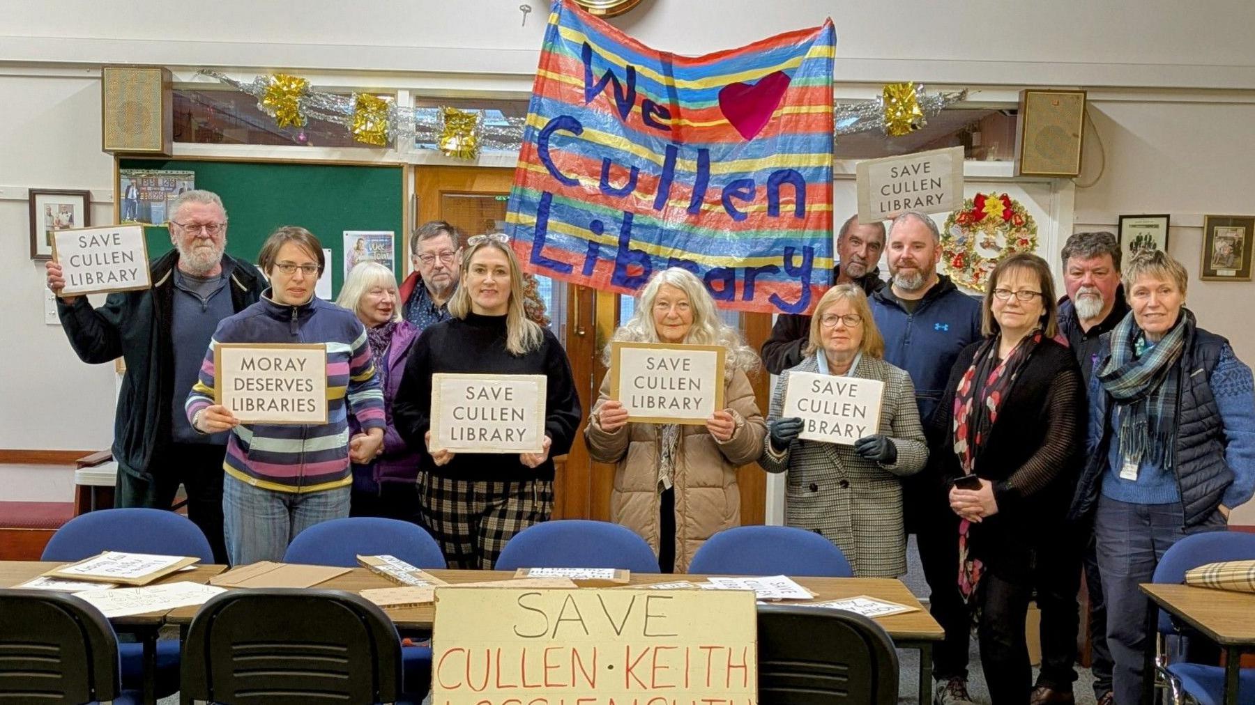 MSP Karen Adam pictured with a group of campaigners in Cullen library