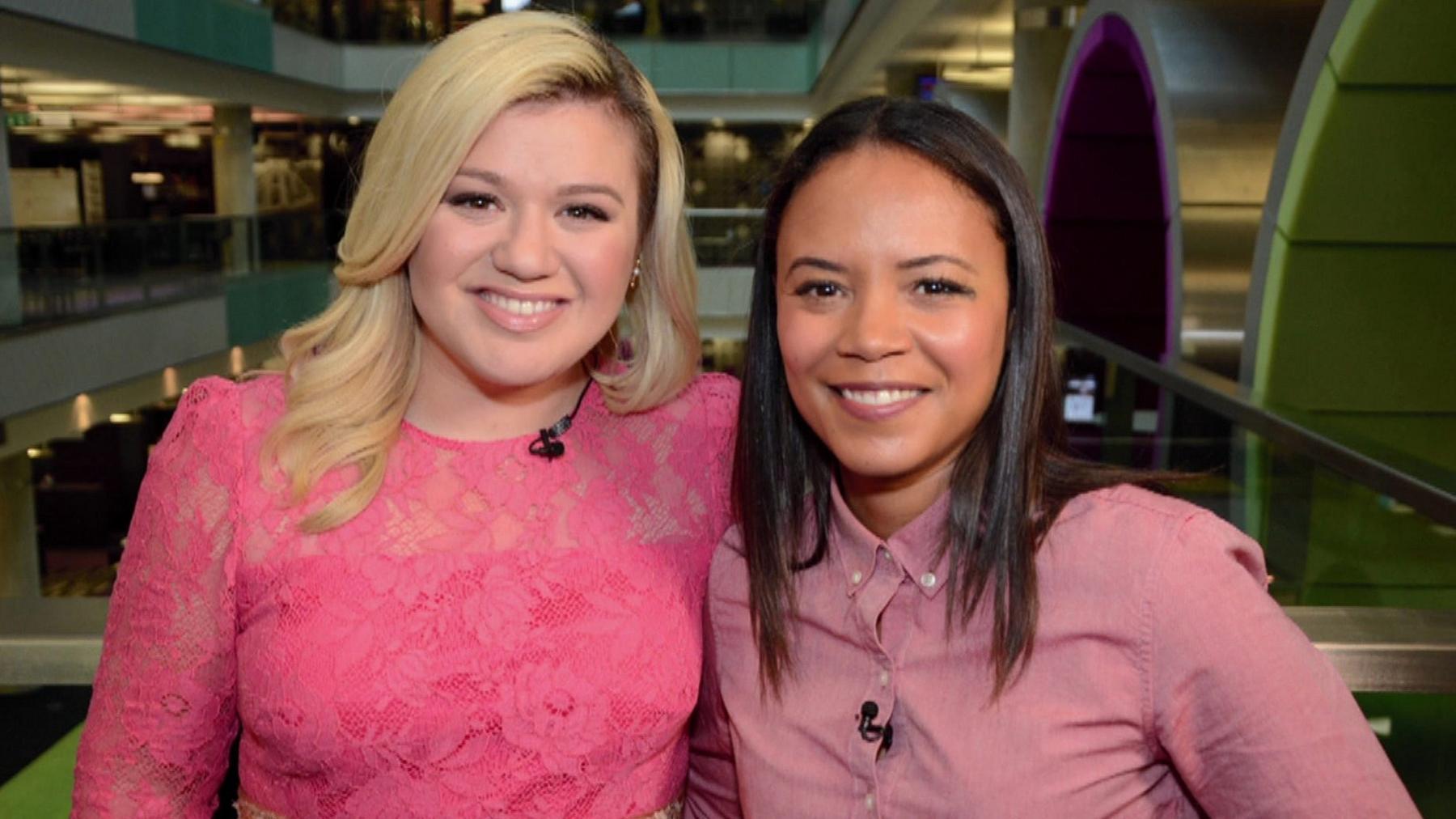 Singer Kelly Clarkson with news reporter Leah Boleto