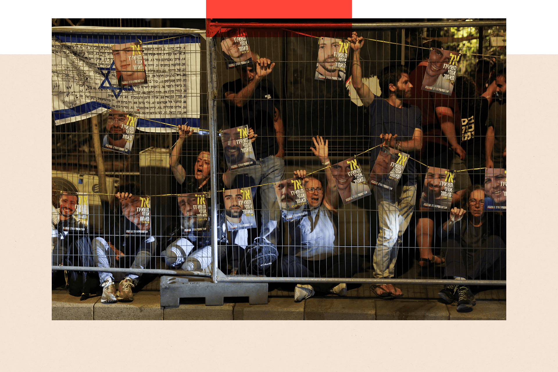 People take part in a protest demanding the release of all hostages