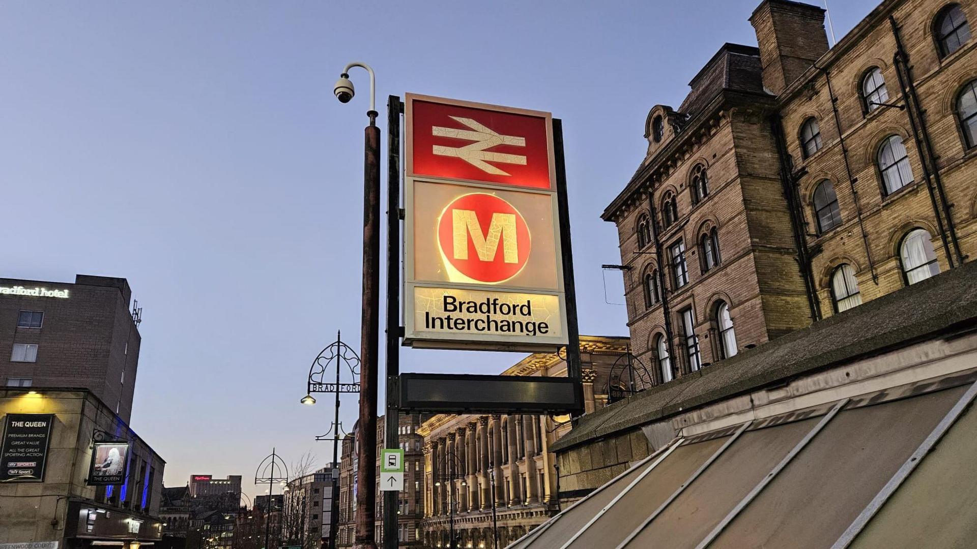 The illuminated sign at Bradford Interchange, pictured at dusk