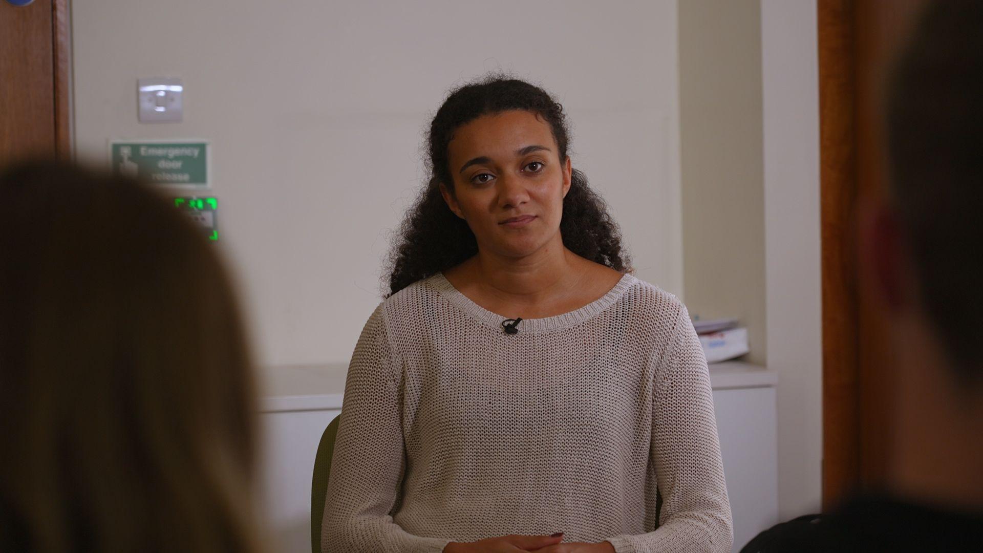 Nina Blissett speaking to people.