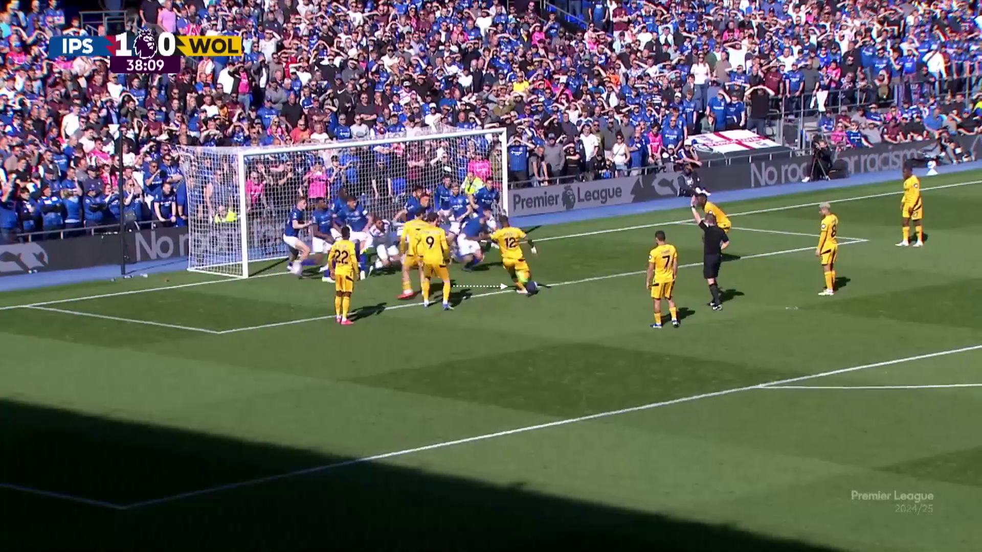Screengrab from Ipswich vs Wolverhampton Wanderers from the 2024/25 season, showing Wolves' indirect free-kick taken from inside the box, with all 11 Ipswich players in the six yard box defending. 
