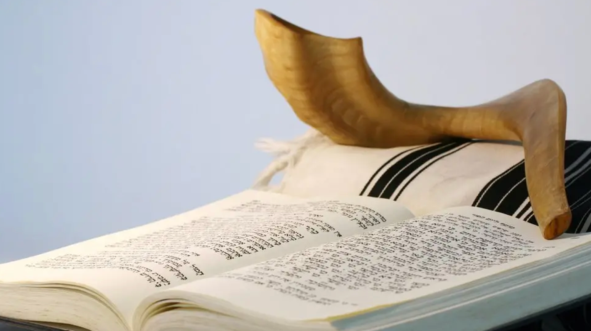 Shofar on top of a religious book