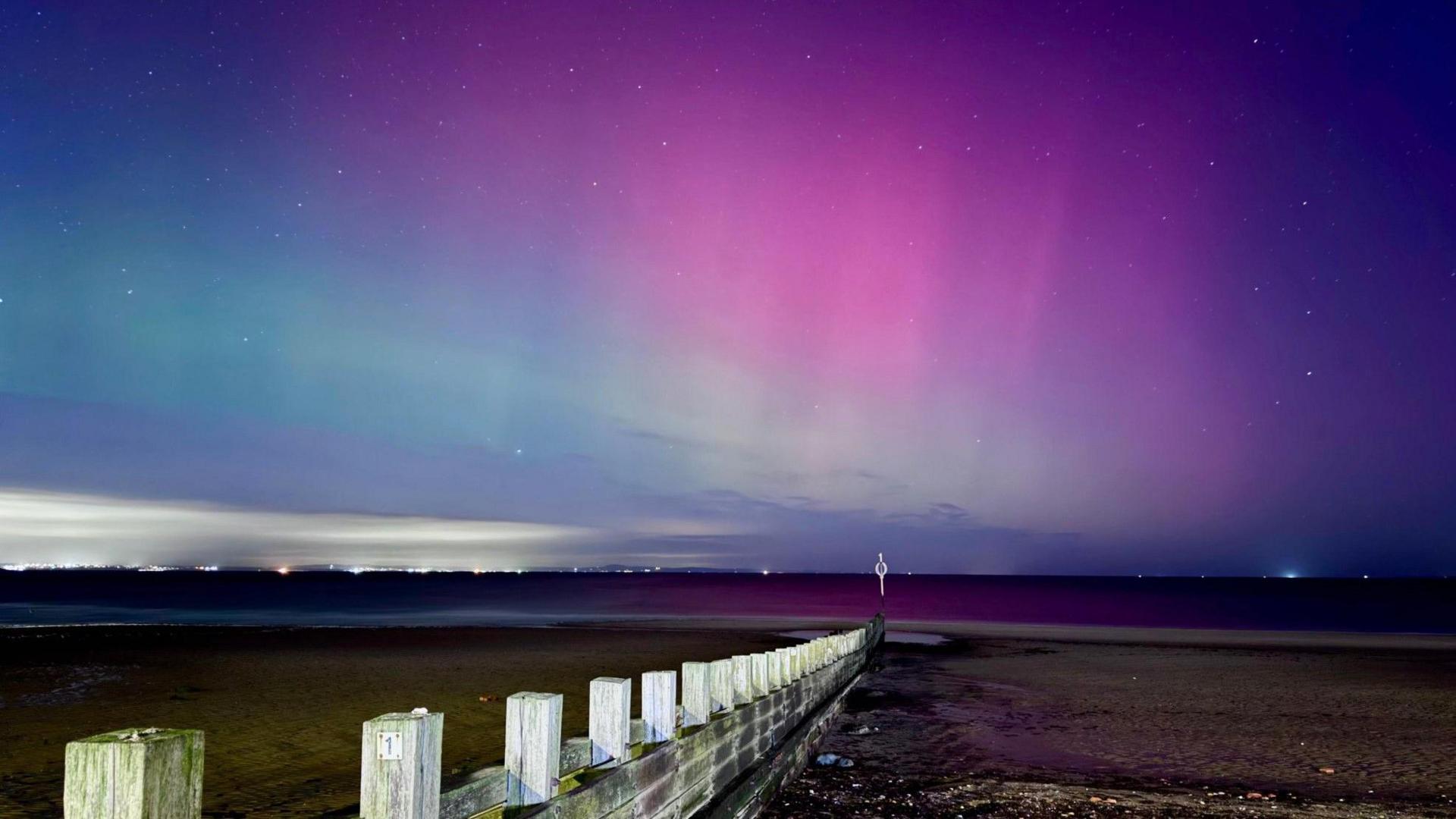 Beautiful blue, purple and pink sky caused by the Northern Lights early Wednesday morning