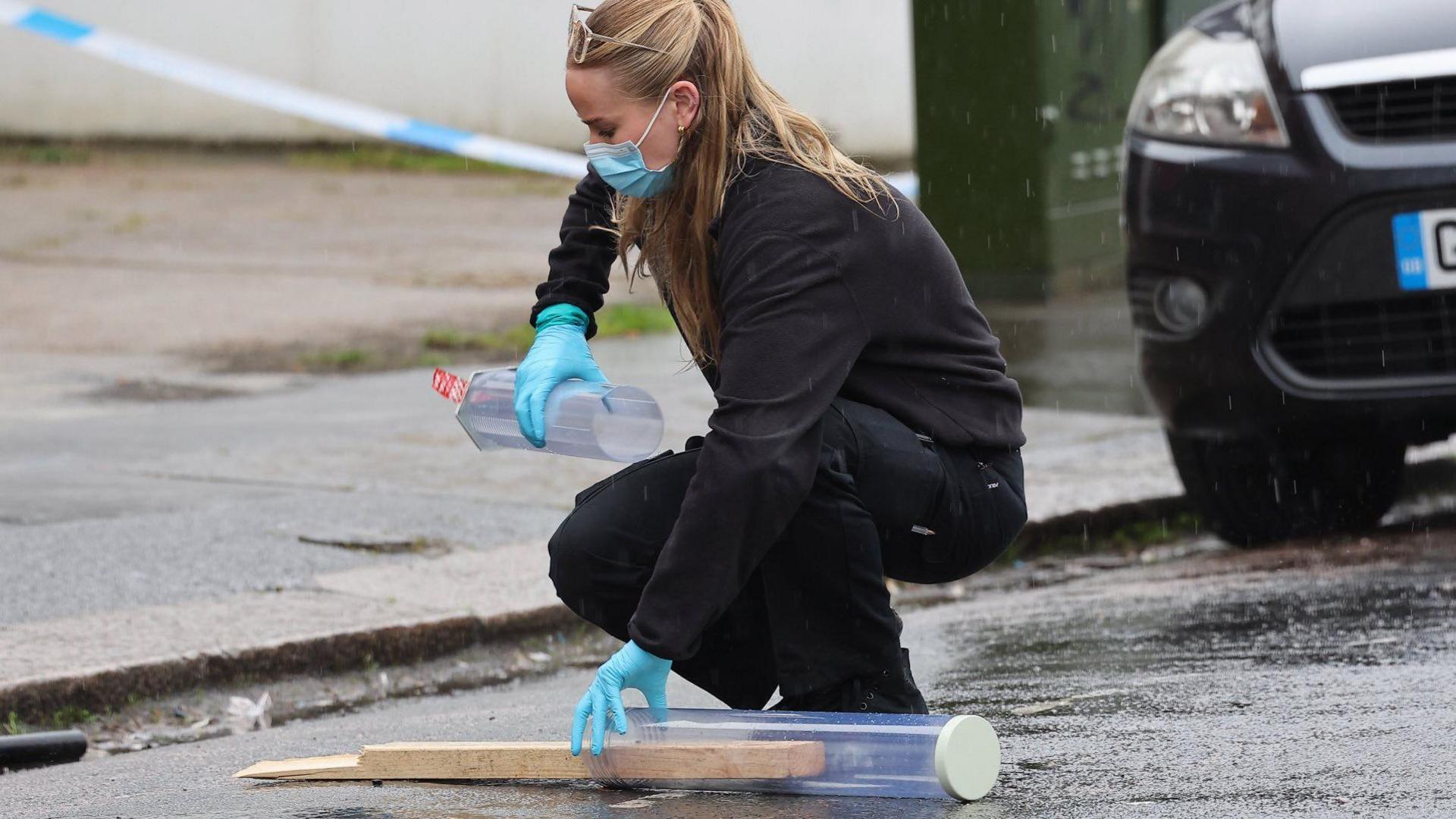 Police at the scene in Station Road, Portslade