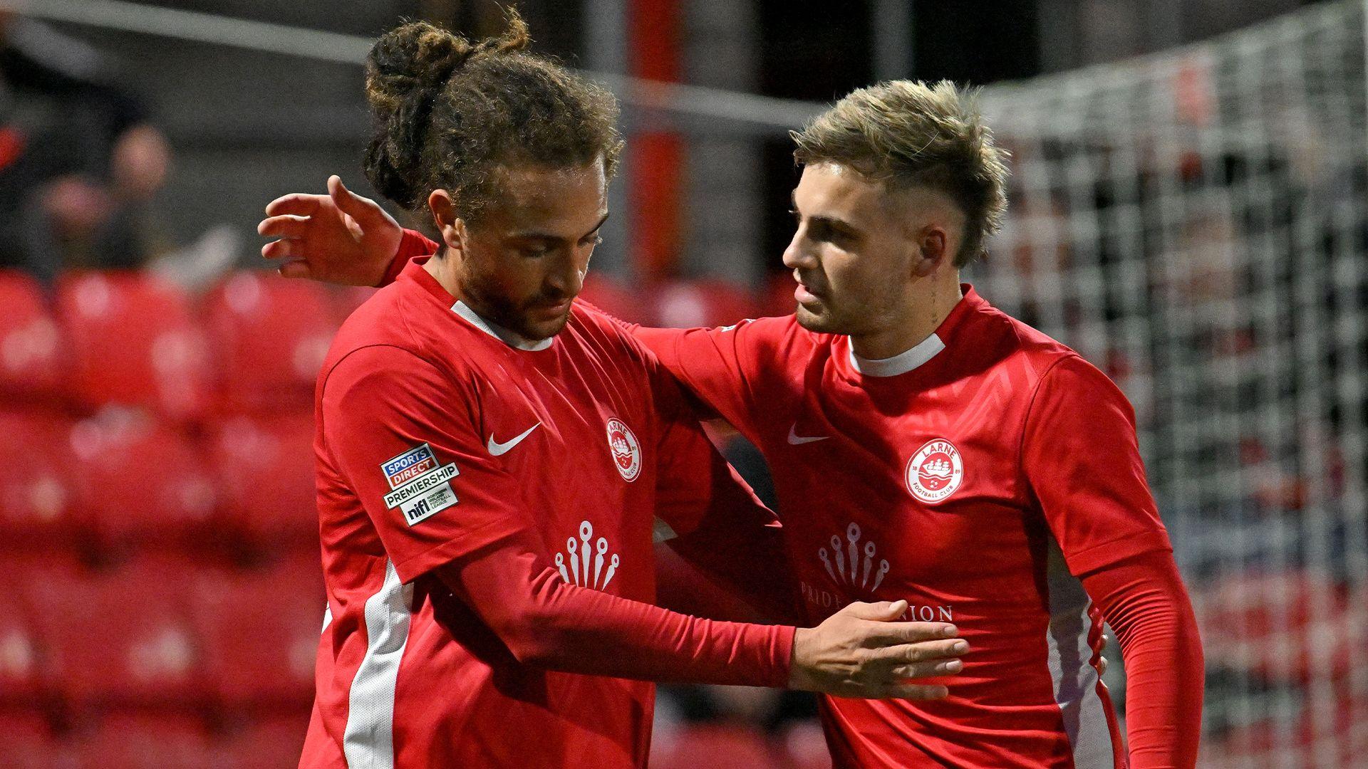 Dan bent and Sean Graham celebrate