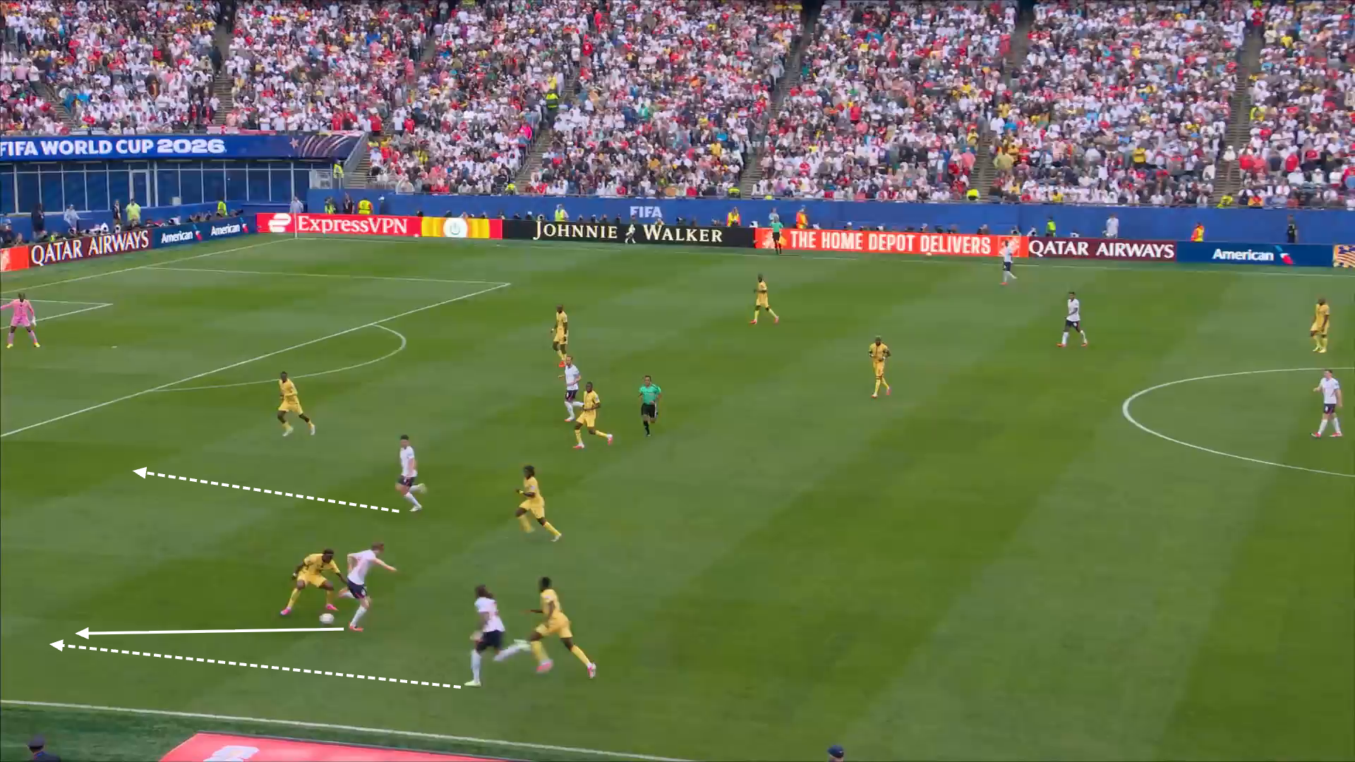 Screen grab from England 0-0 Ghana showing the forward runs of Spence and Rice illustrated by dashed arrows. There is a solid arrow showing the path of the back-heel pass from Gordon to Spence.
