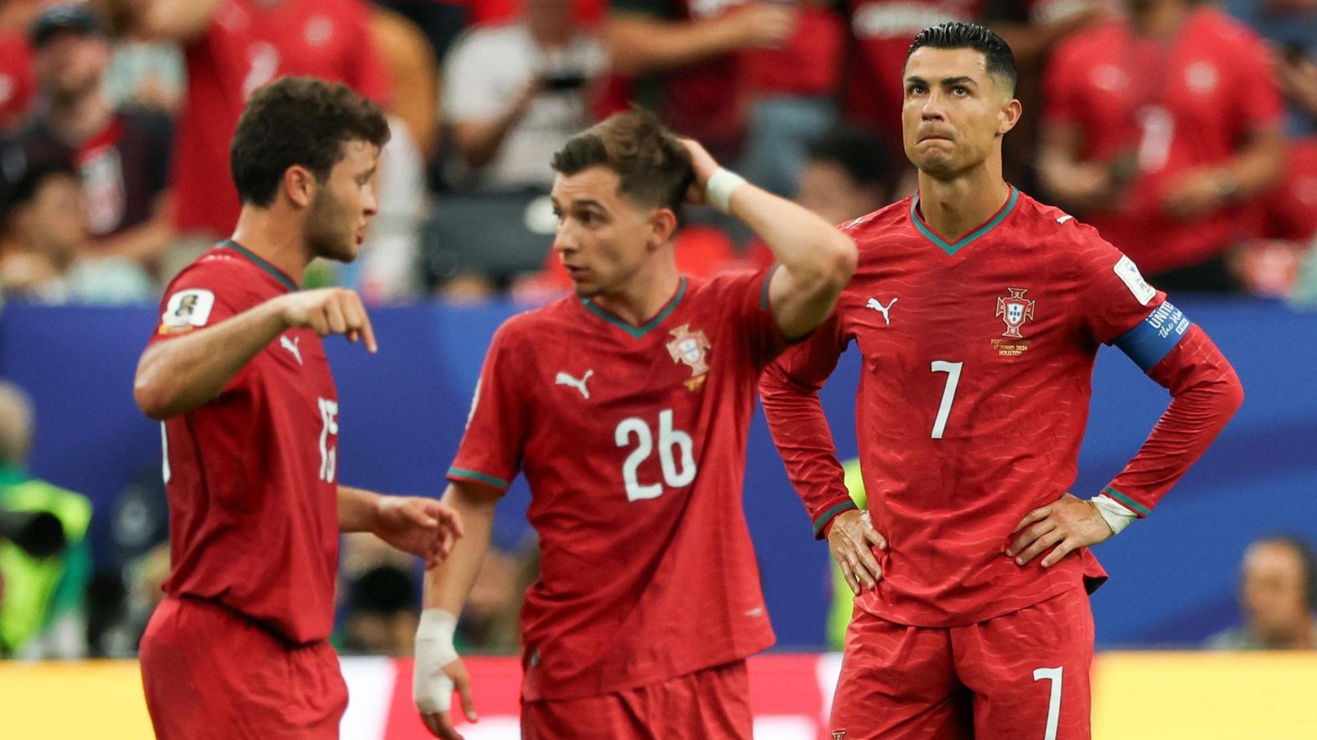 Joao Neves and Cristiano Ronaldo