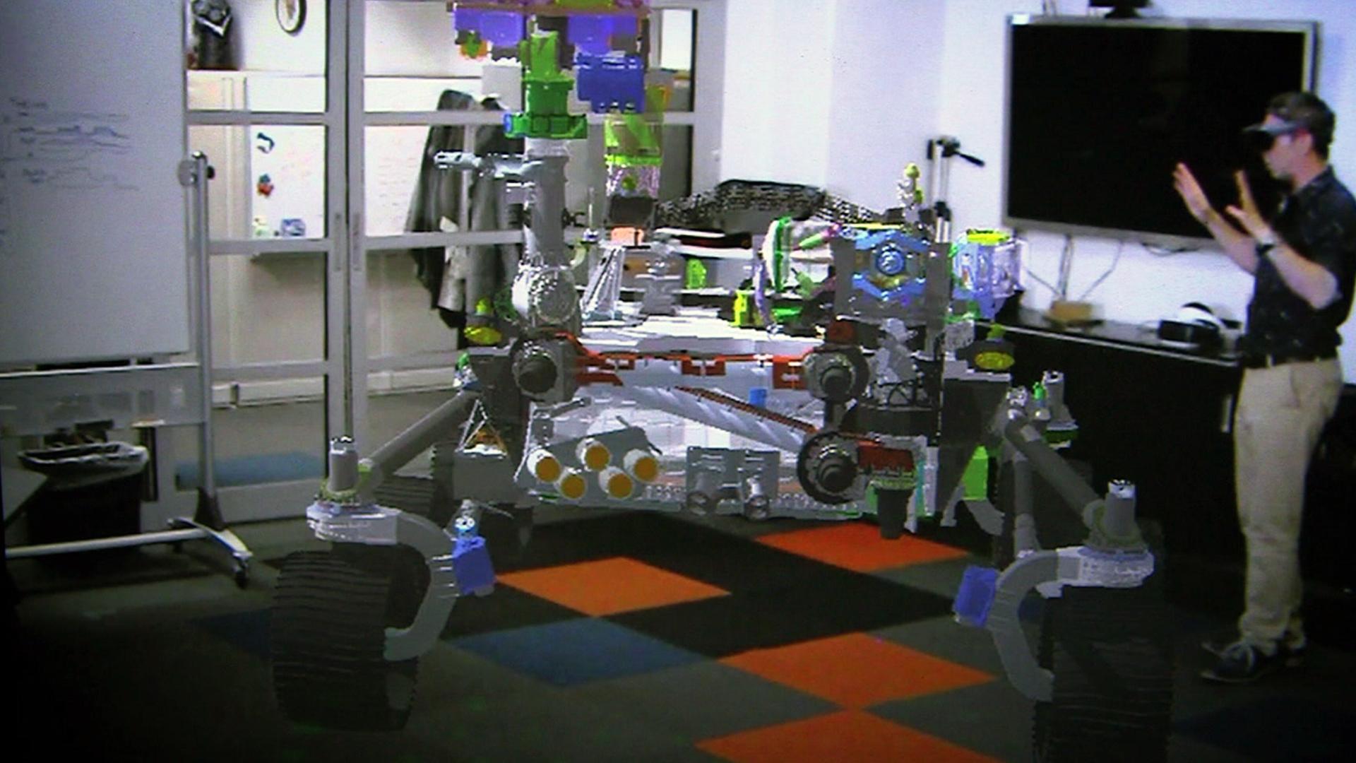 An augmented reality image of a Mars rover design