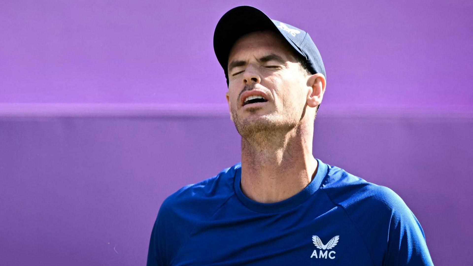 Andy Murray reacts after a point at Queen's