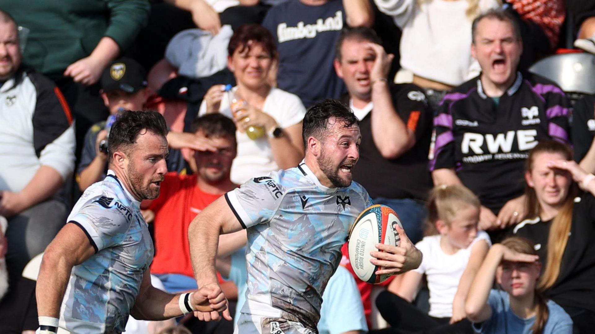 Ryan Conbeer sprints away to score a try in his opening competitive game for Dragons