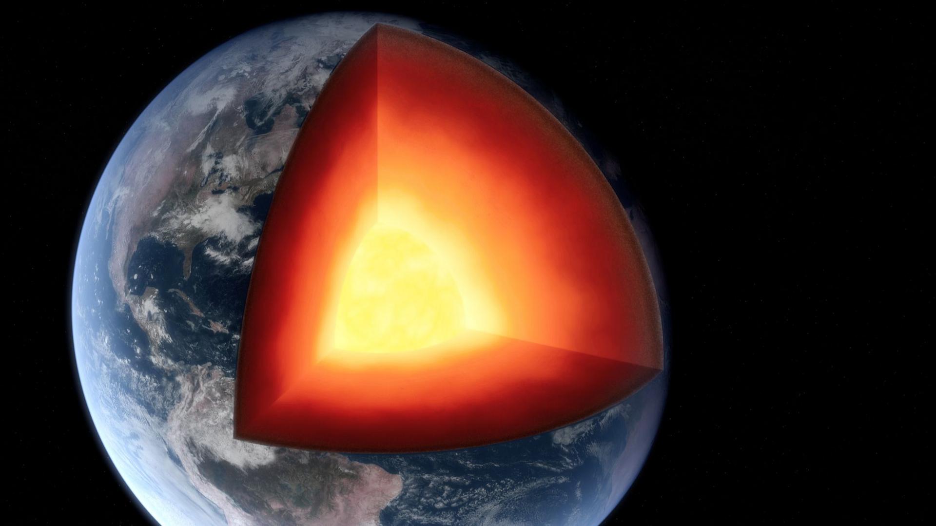 A 3D illustration of Earth with a slice cut out revealing the layers including the core.