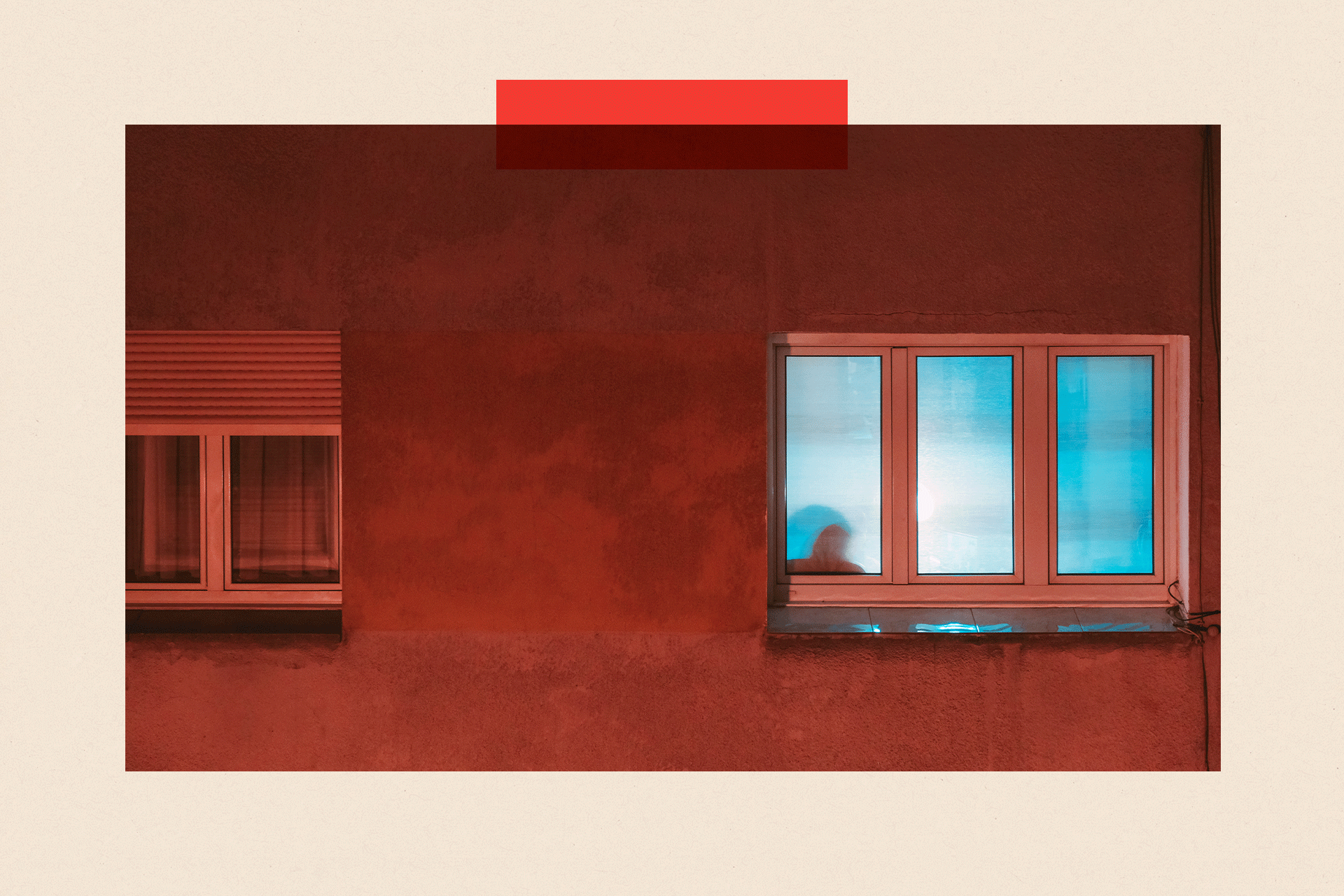 A window with an individual visible inside