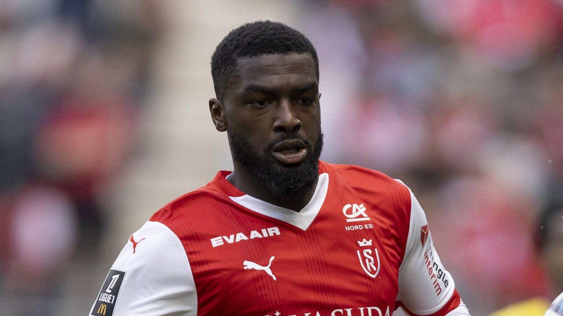 Cedric Kipre playing for Reims