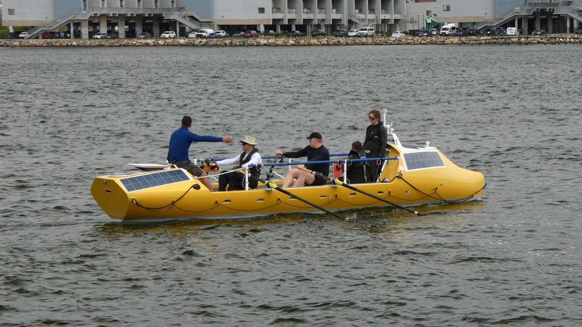 The team in the boat on the water 