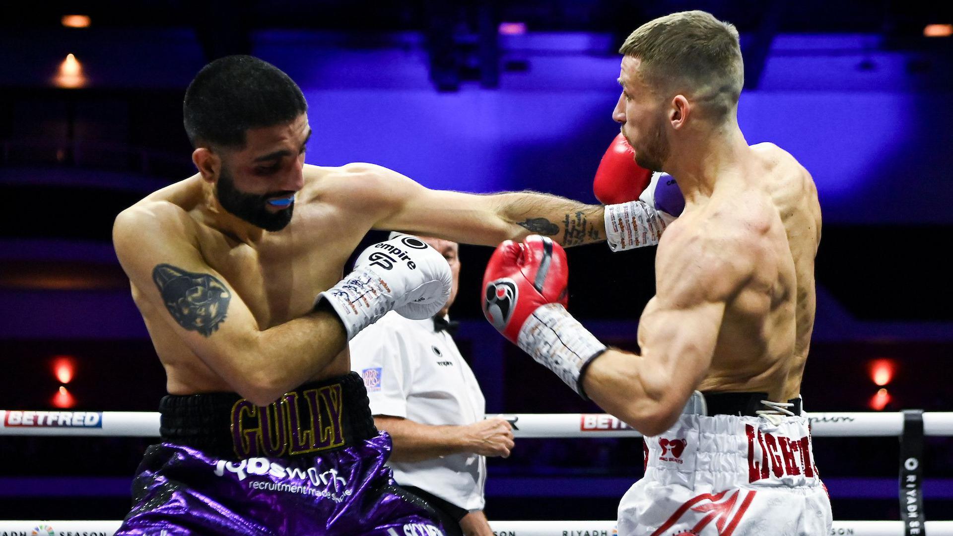 Gully Powar (left) and Rhys Edwards in action