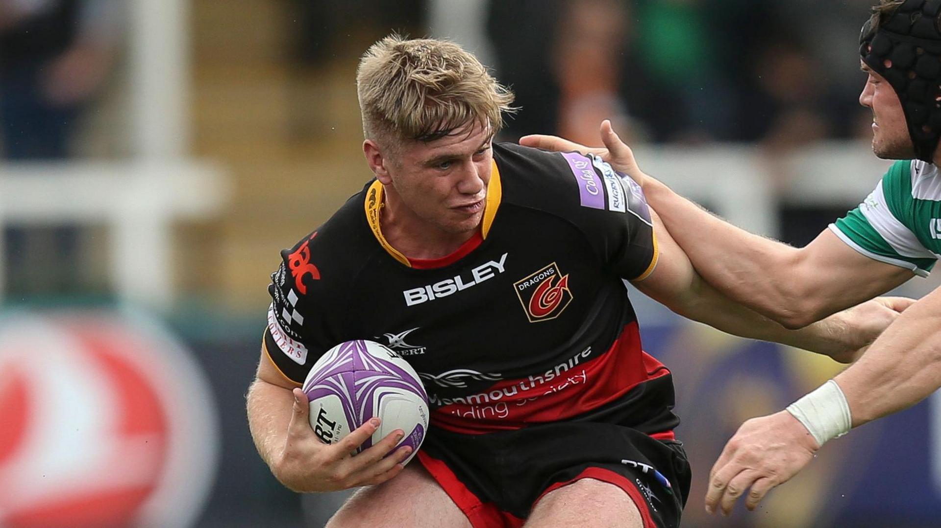 Aaron Wainwright carries the ball for Dragons at Newcastle