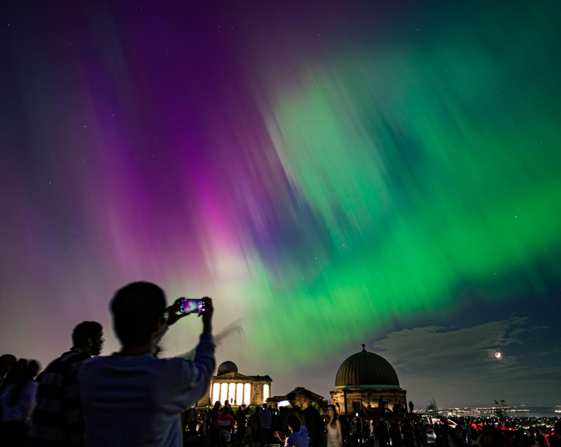 People watch Northern Lights in Edinburgh