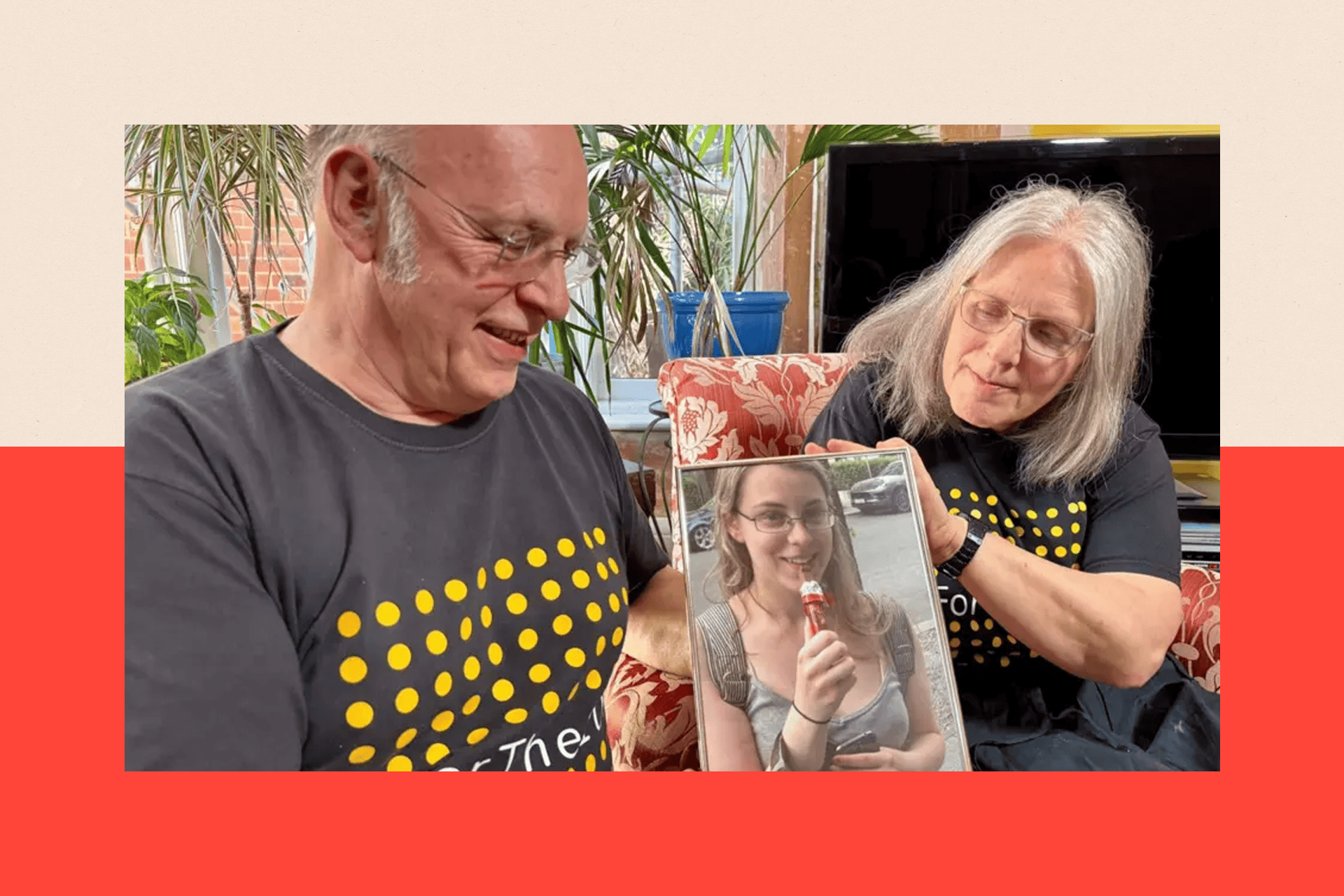 Bob and Maggie holding an image of their daughter Natasha