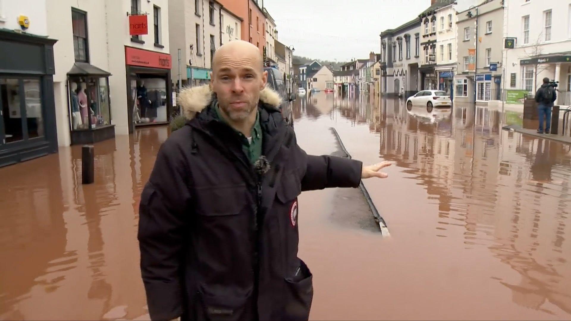Will Vernon standing in floodwater in Monmouth