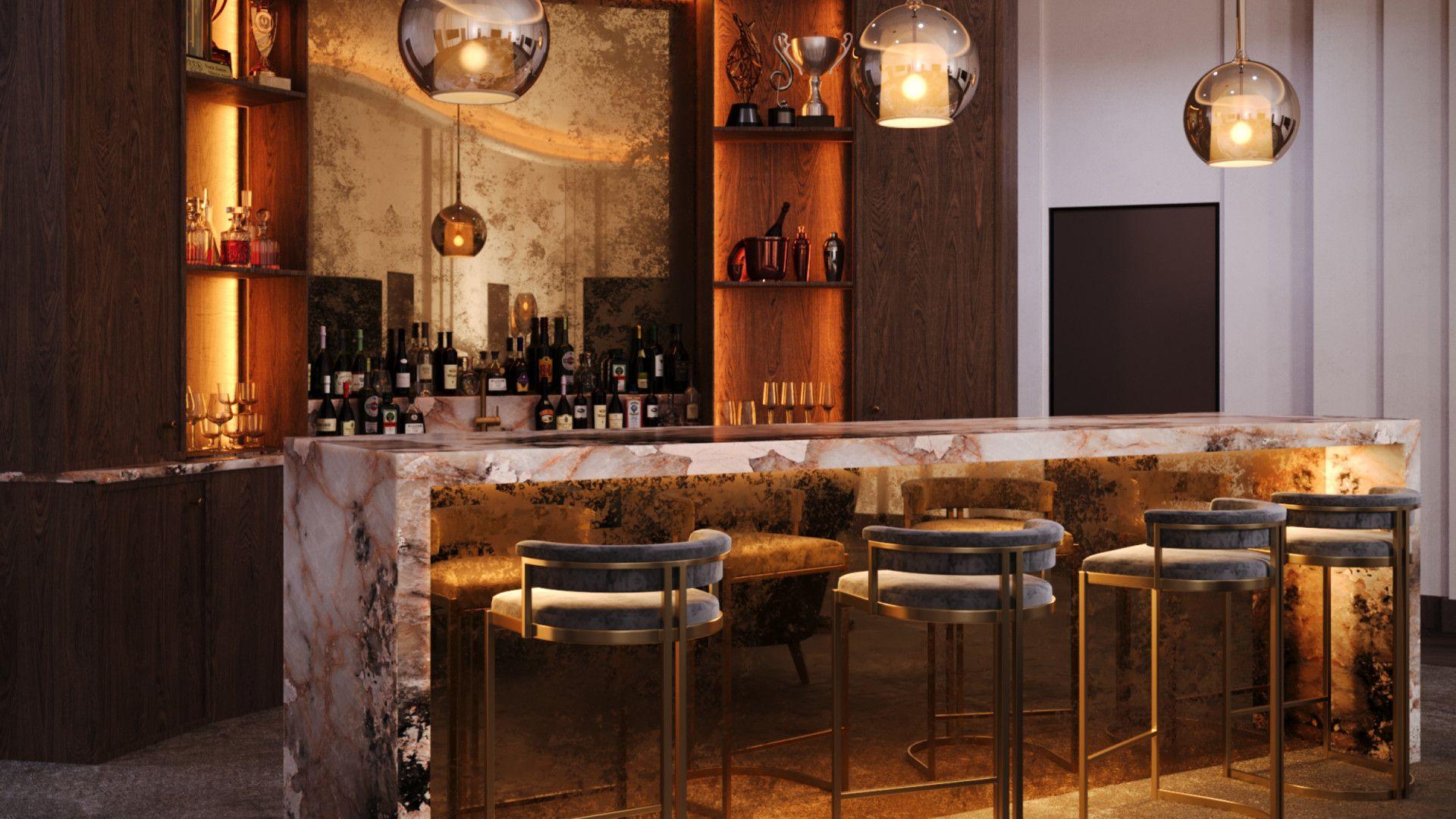 A marble bar top with chairs in front of it. The decor features autumnal colours.