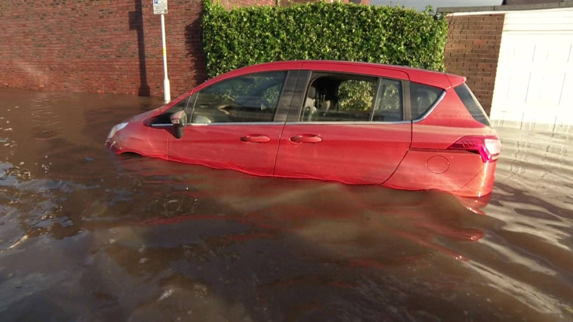 Car in the floods in Carlisle in Cumbria