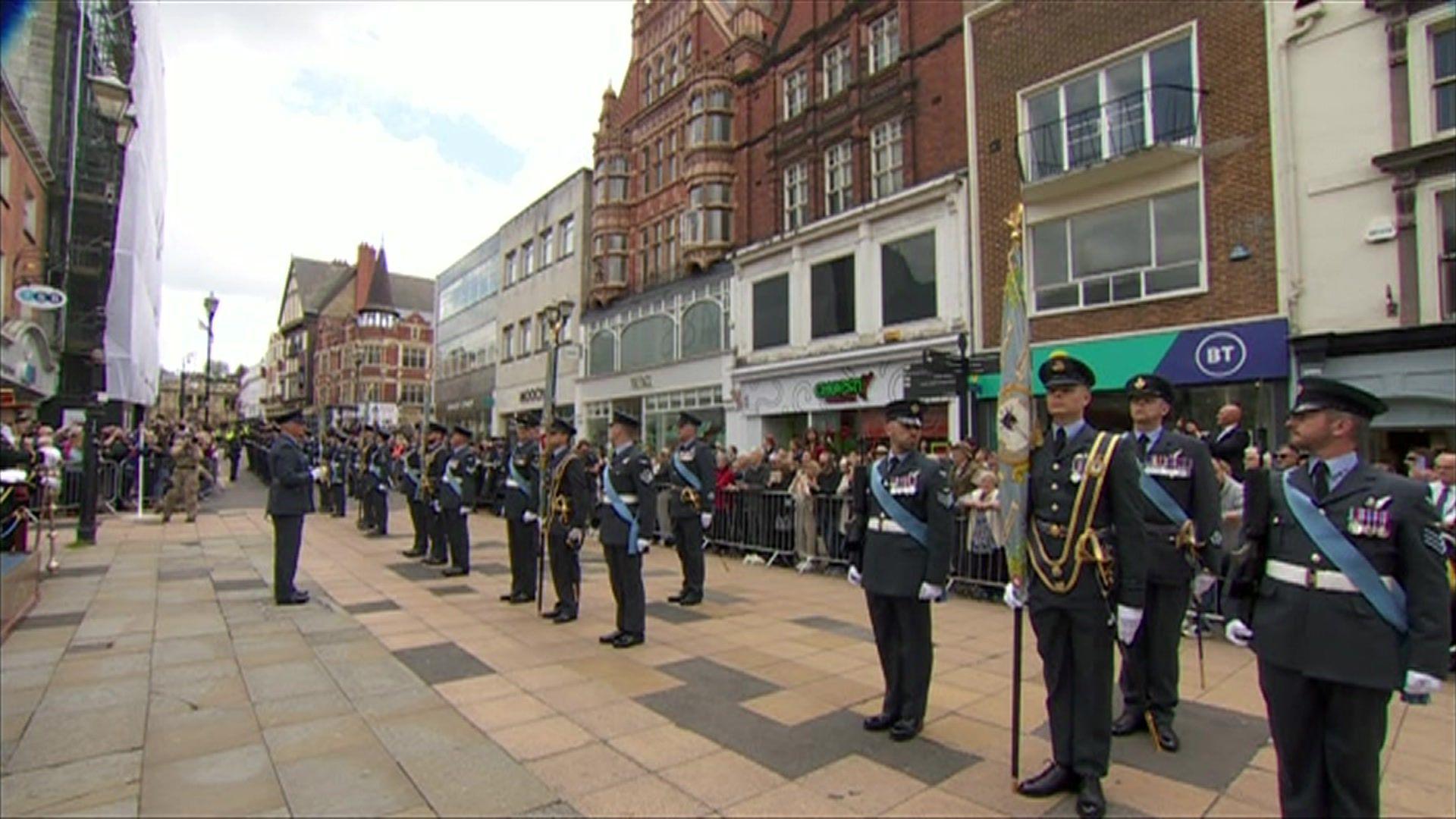 RAF Waddington personnel are greeted at the war memorial in Lincoln high street