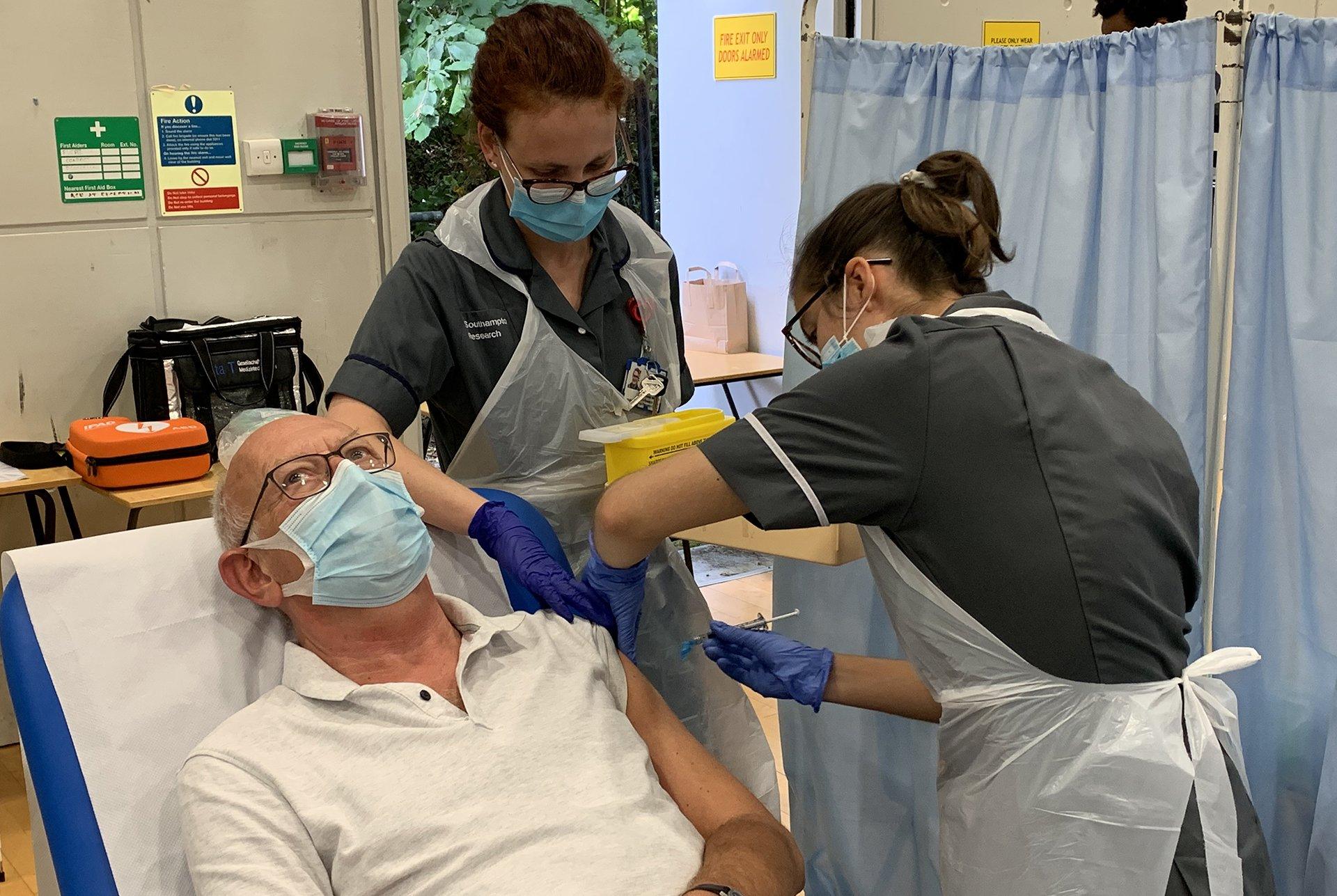 A volunteer receives the vaccine in Southampton