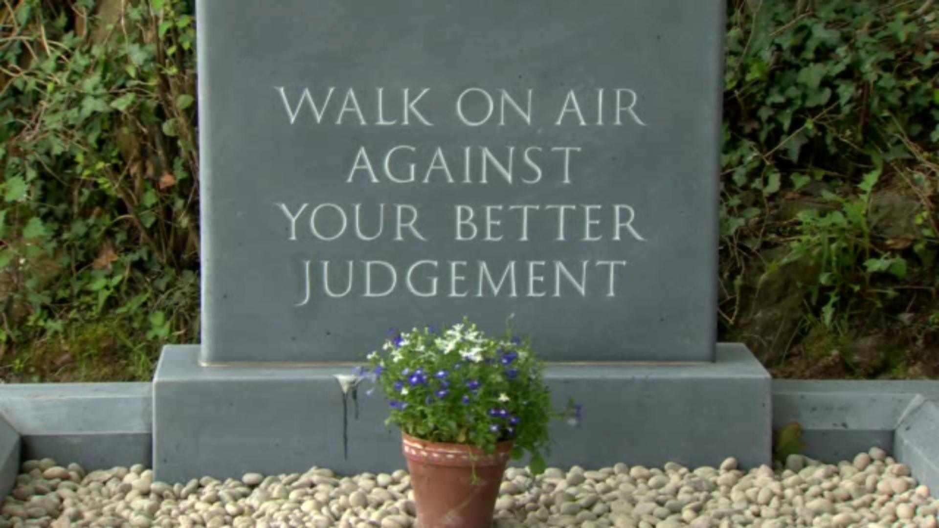 The inscription on the headstone is a line from Heaney's poem The Gravel Walks