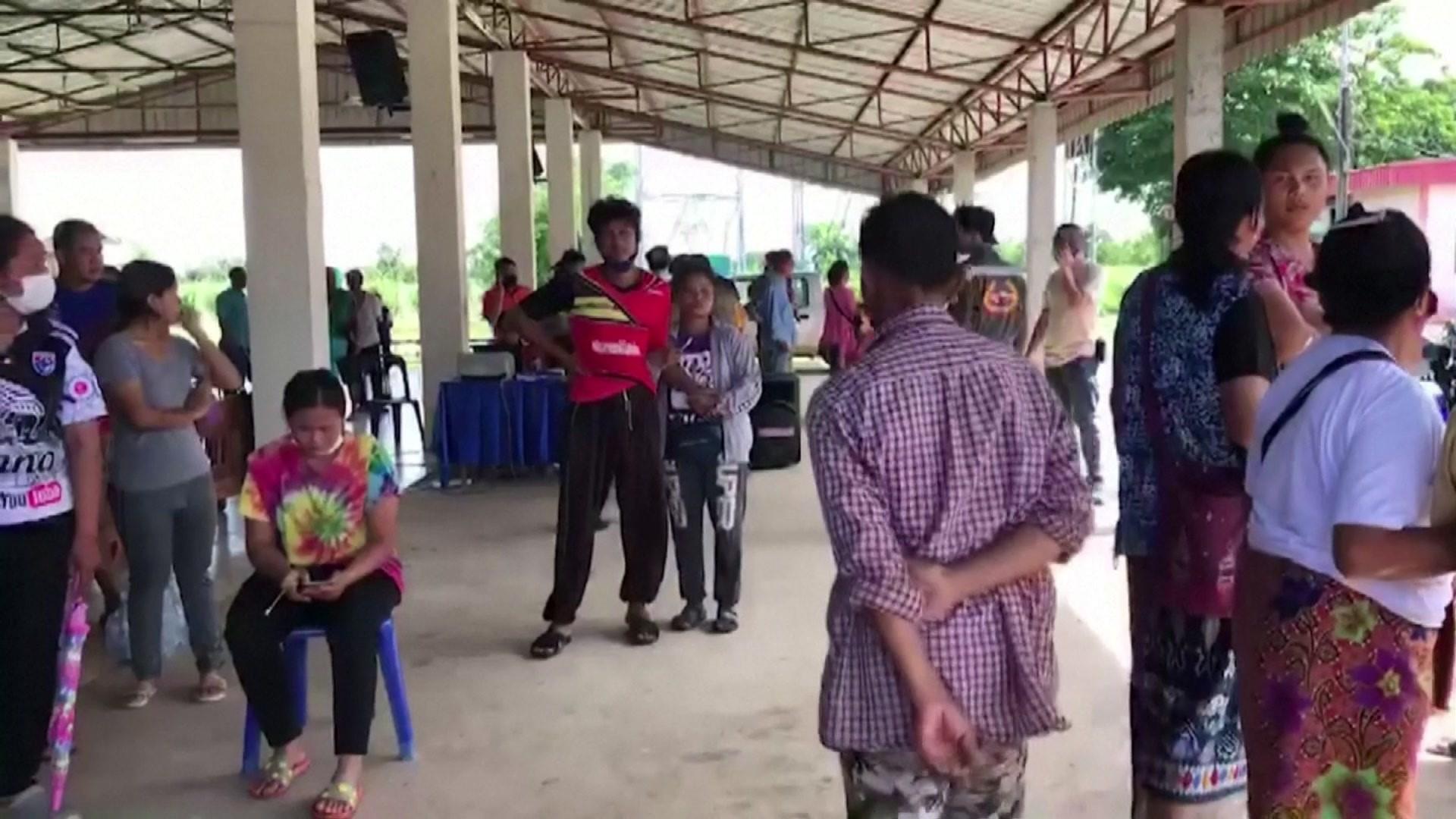 Families wait at the nursery school